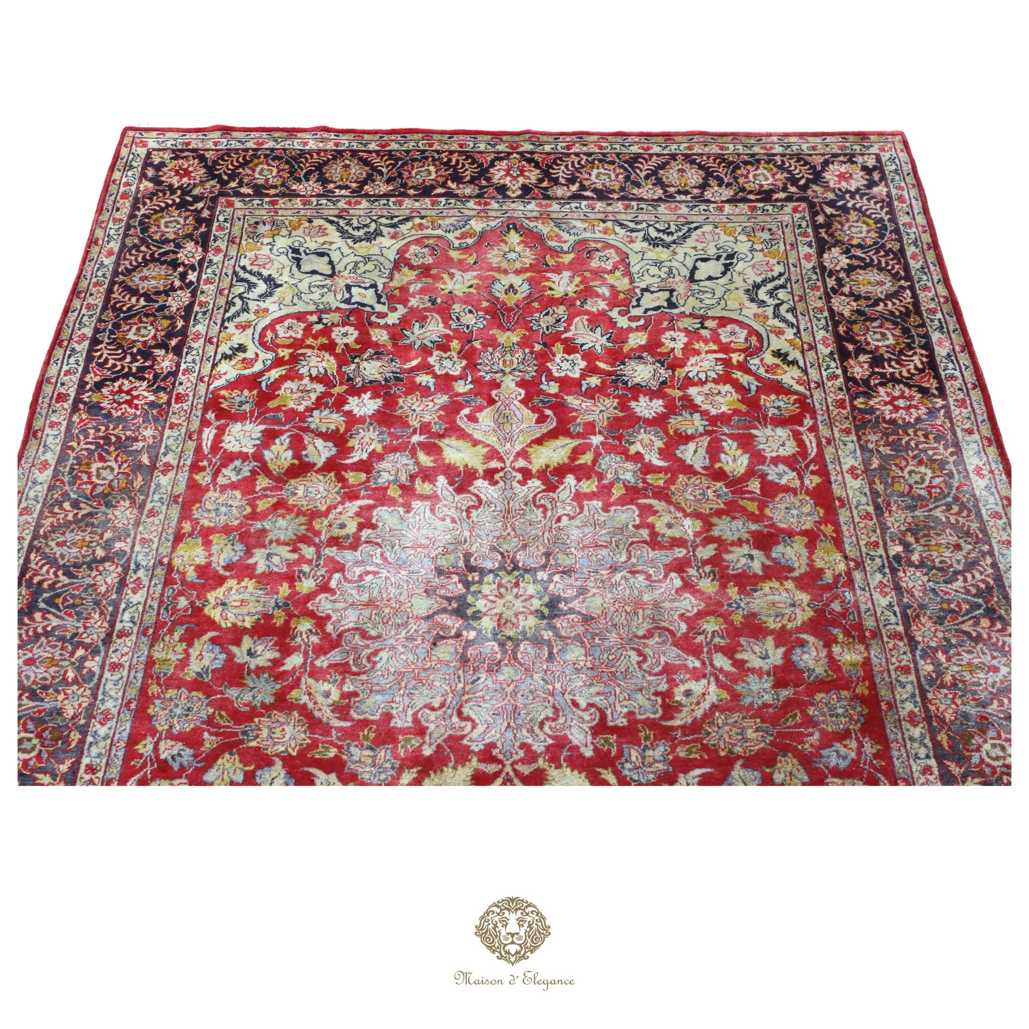 Decorative rug with intricate patterns on a red background