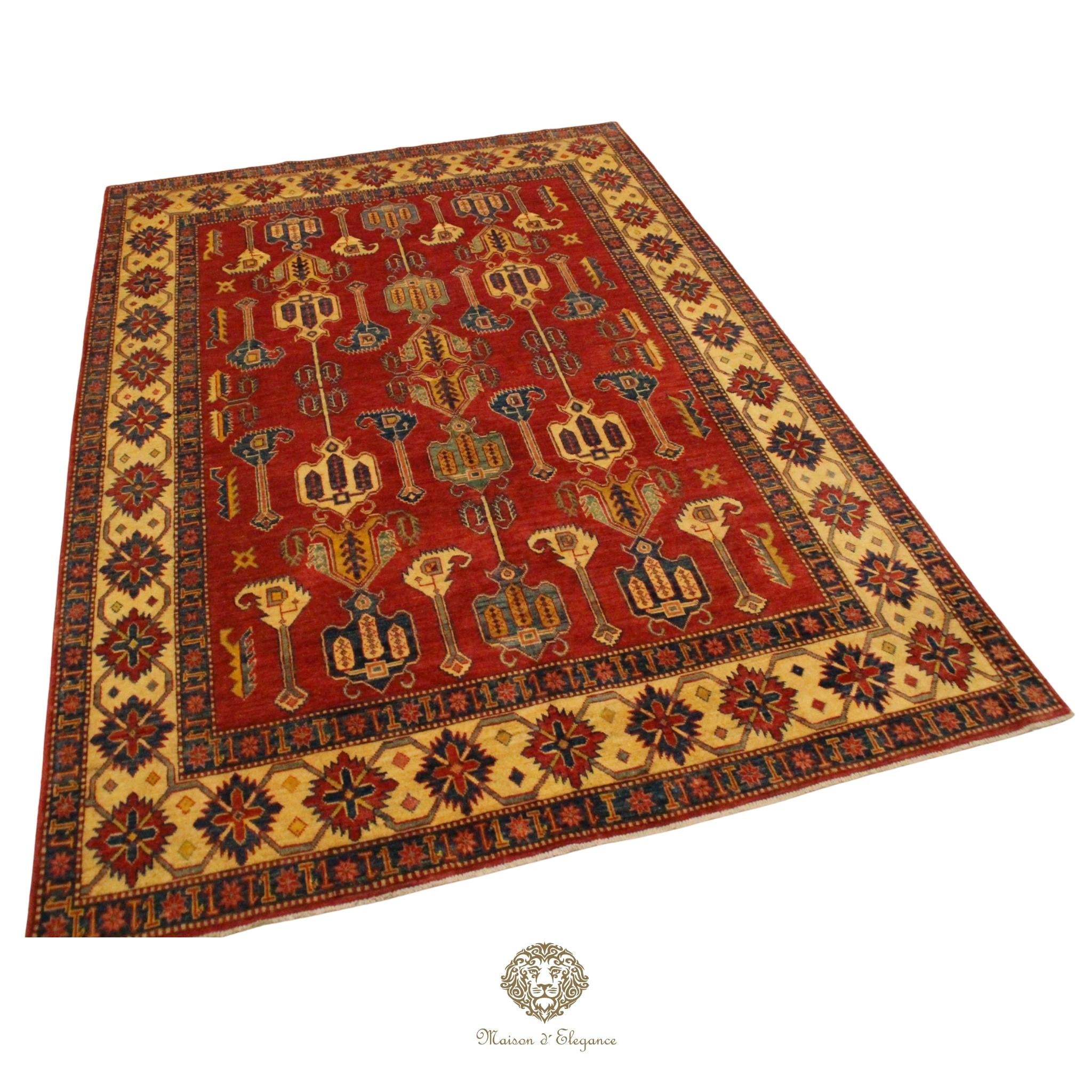 Decorative rug with intricate patterns on a Burgundy background