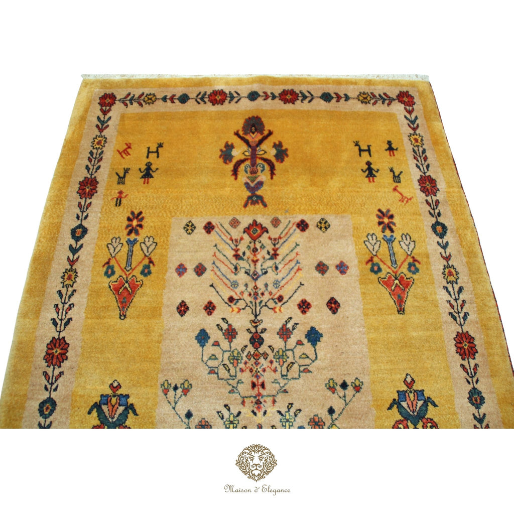 Decorative rug with intricate patterns on a  gold background