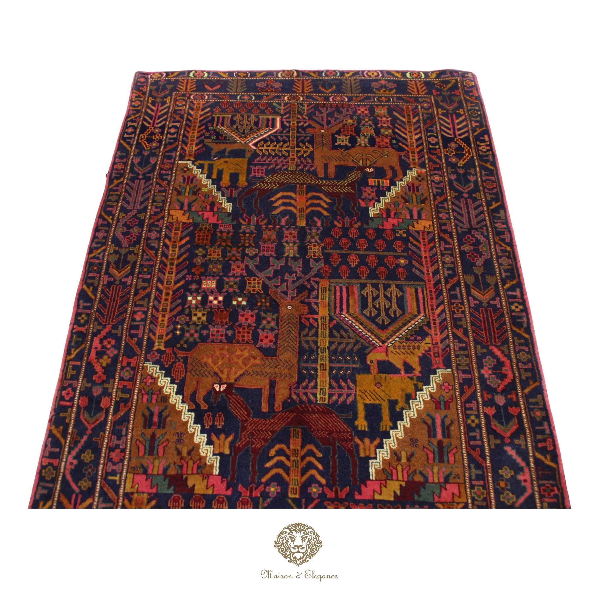 Decorative rug with intricate patterns and animal designs on a navy background