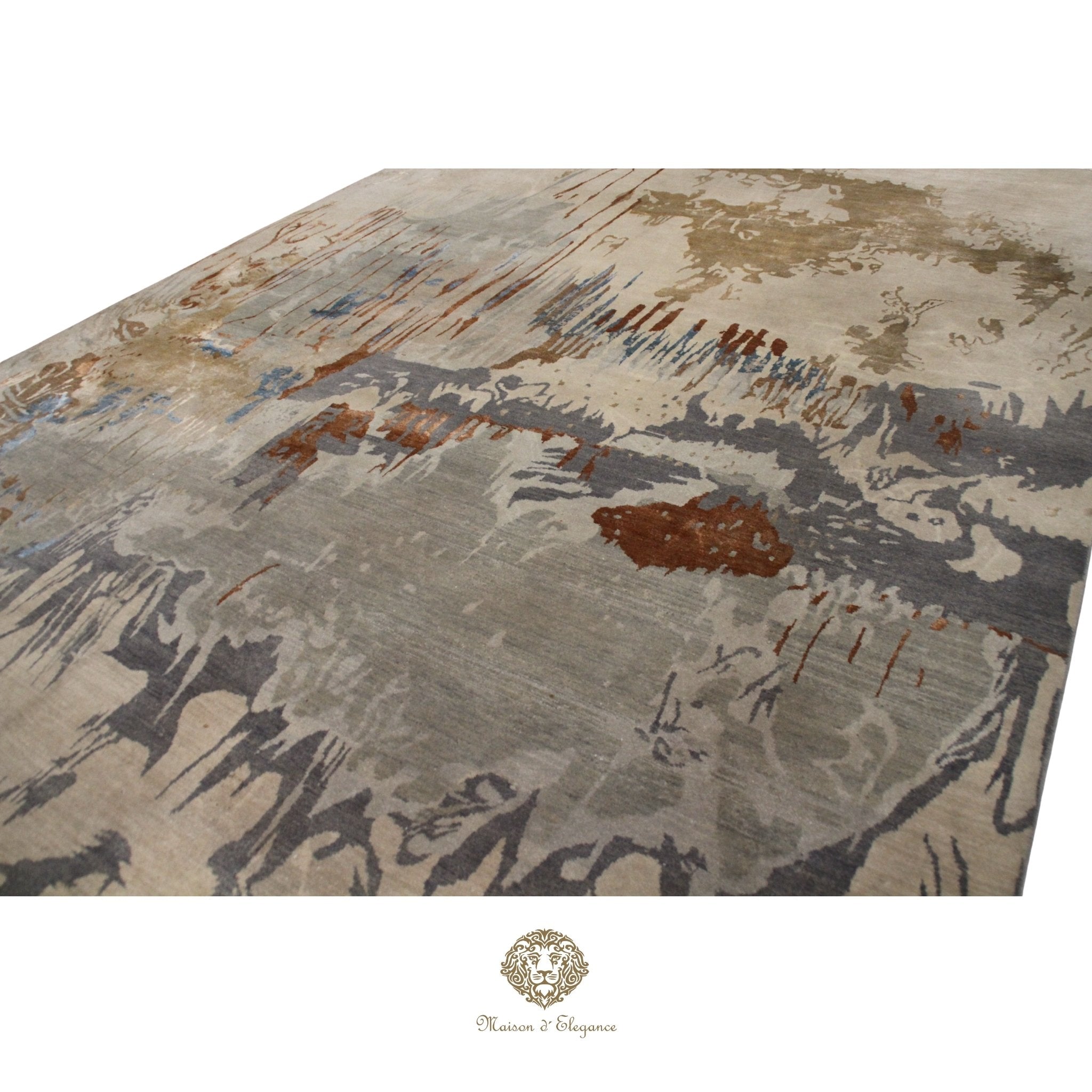 Abstract patterned rug with brown, gray, and beige colors on a Ivory background