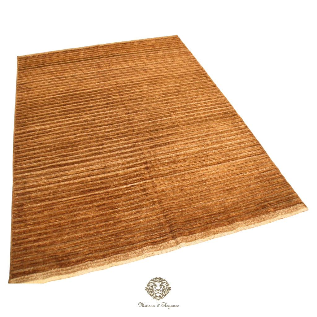 Relief textured rug on a brown background