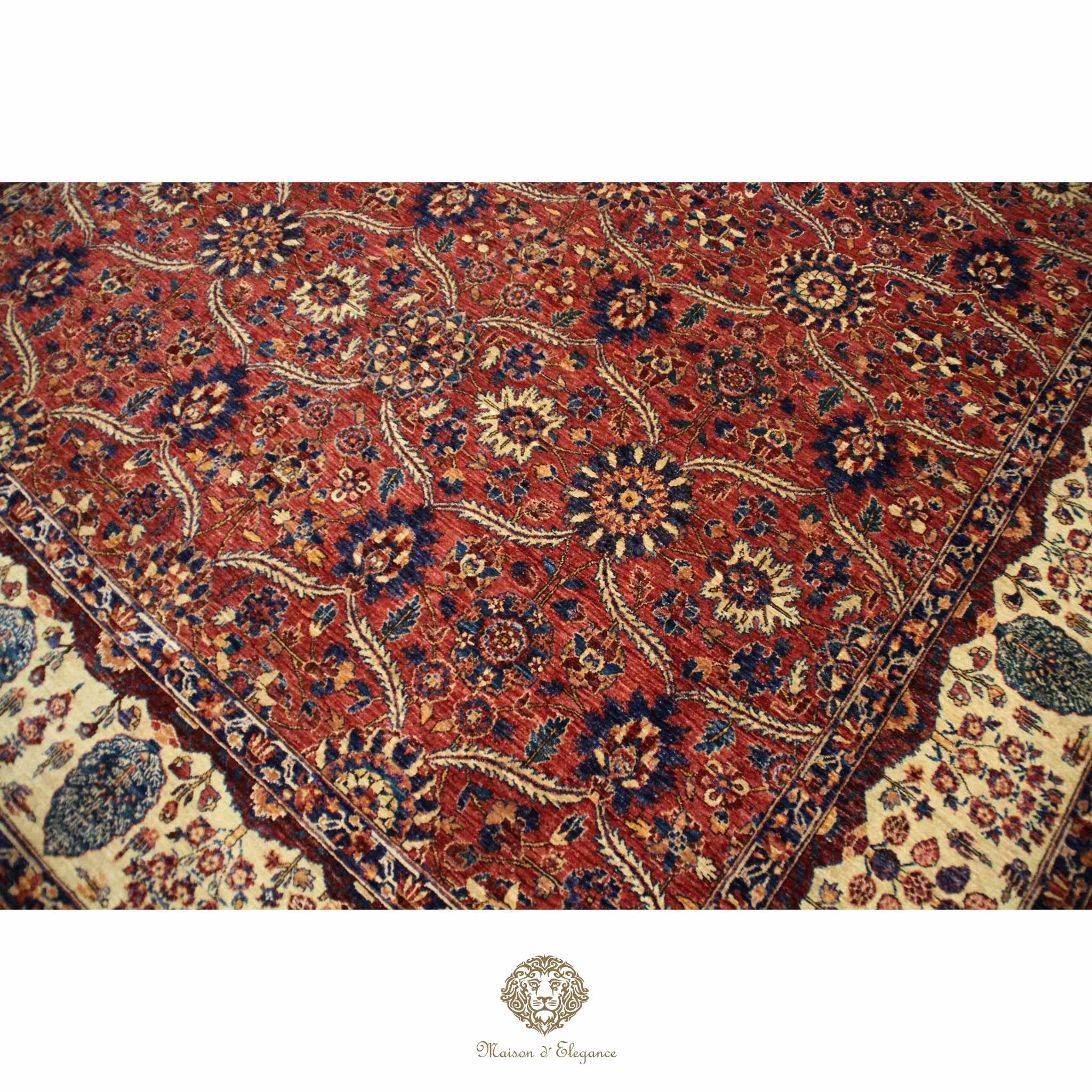 Close-up of a patterned rug with intricate designs on a red background