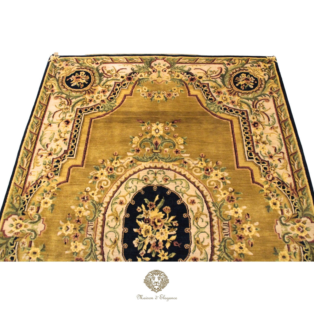 Decorative rug with intricate patterns on a brown background