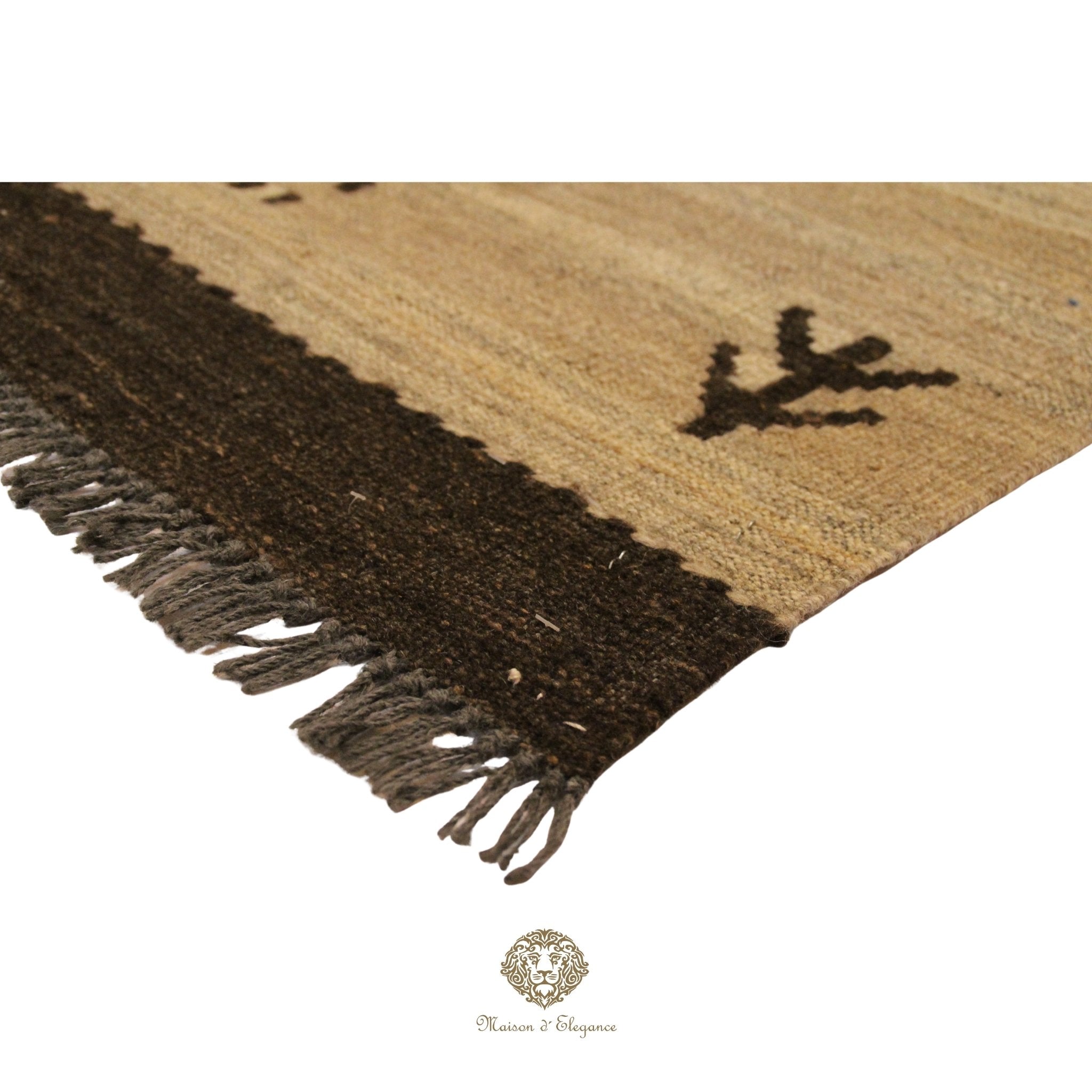 Textured rug with fringe detail on a ivory background