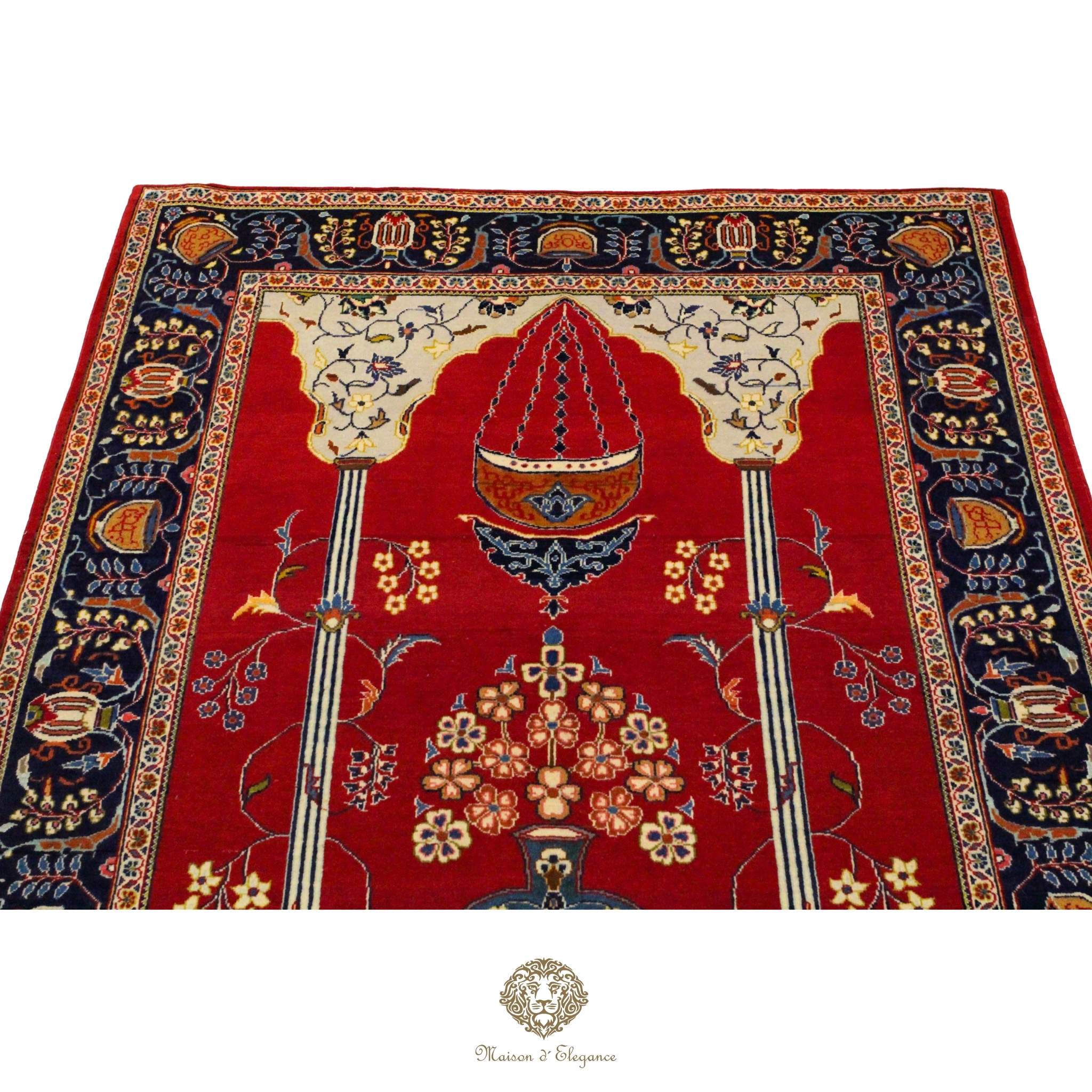 Decorative red rug with intricate patterns on a white background