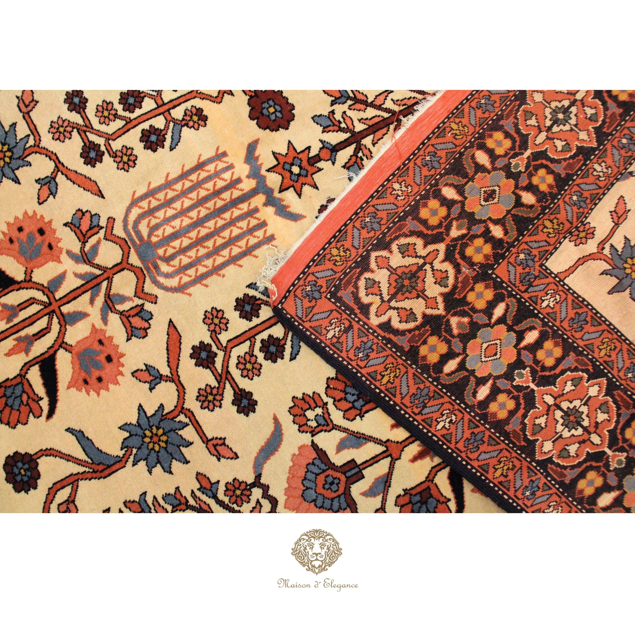 Close-up of a patterned fabric with intricate designs on a ivory background