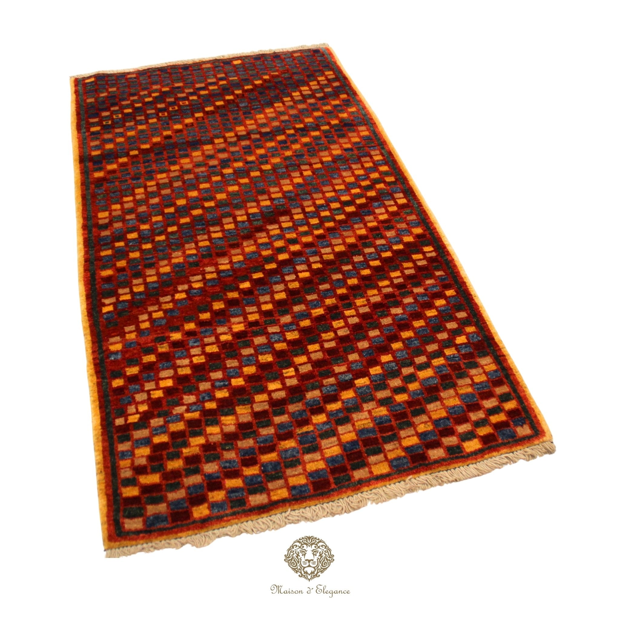 Woven rug with a geometric pattern on a red background