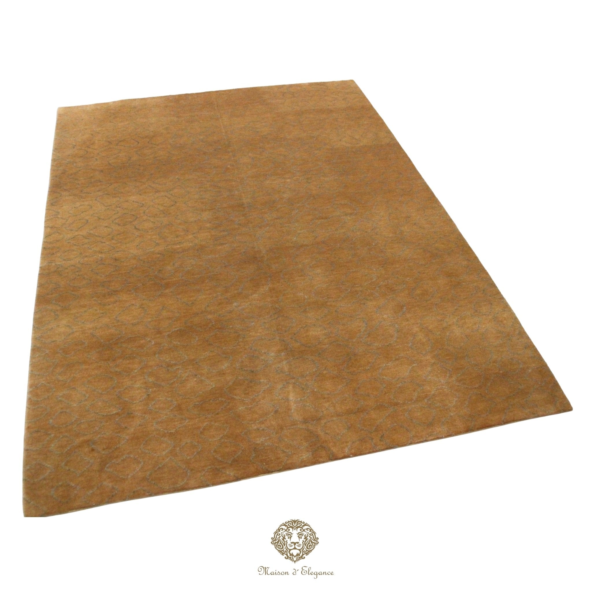 Brown rug with a brand logo at the bottom.