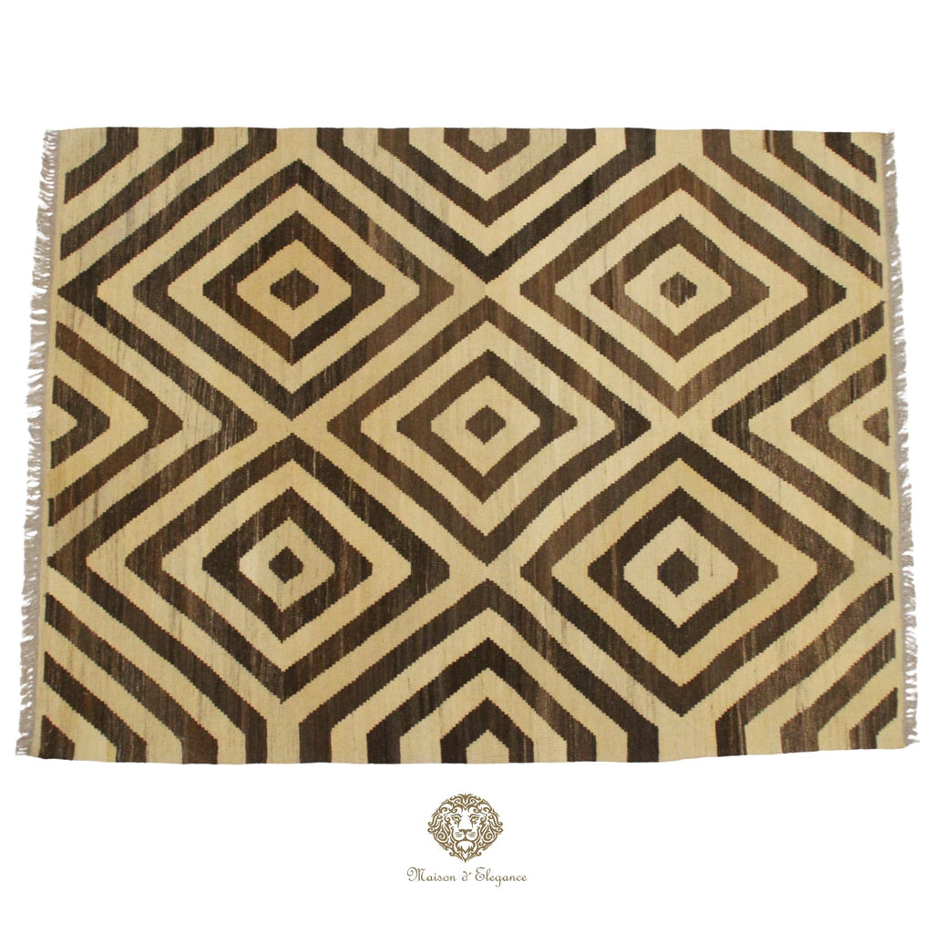 Patterned rug with geometric design on a plain background