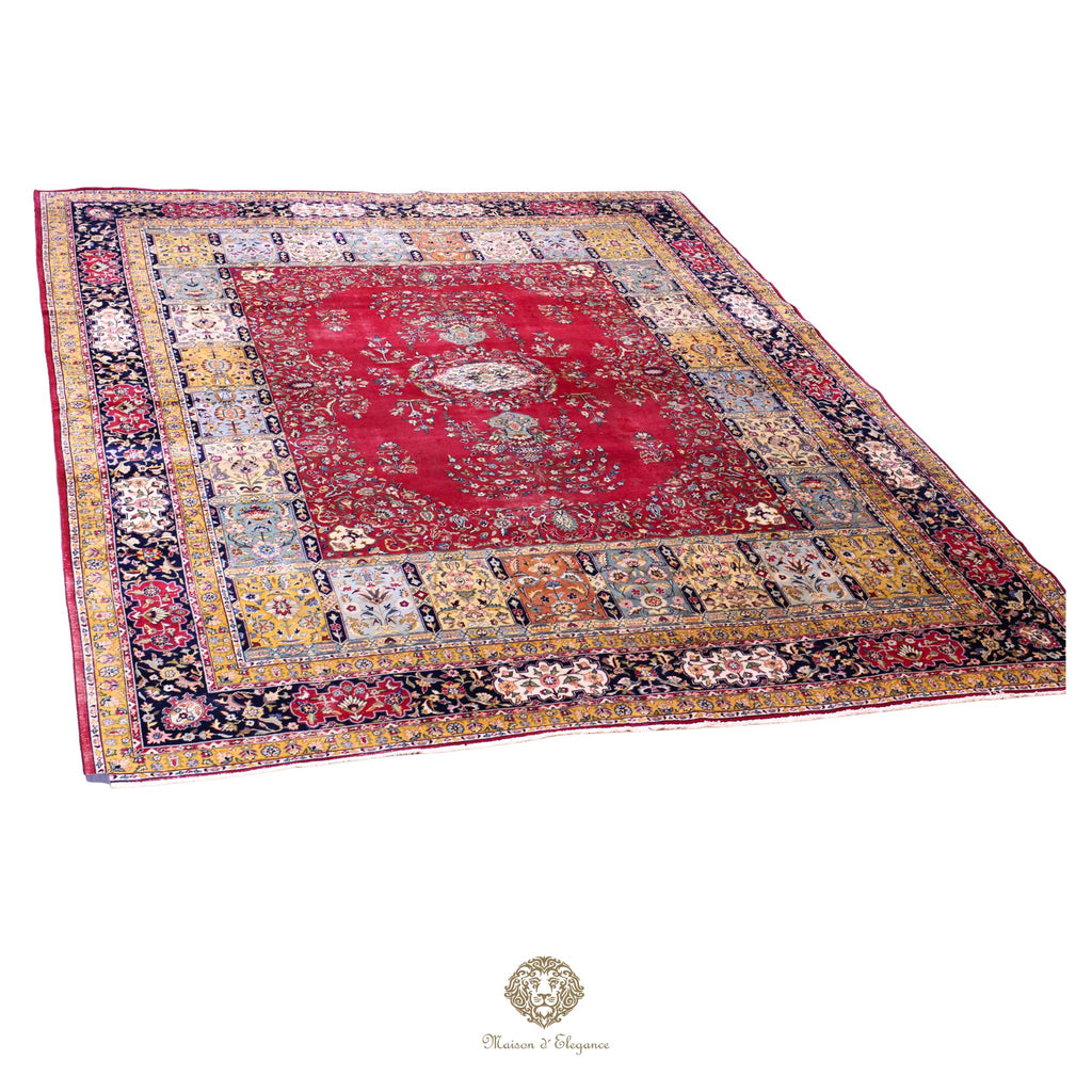 Decorative rug with intricate patterns on a rojo background