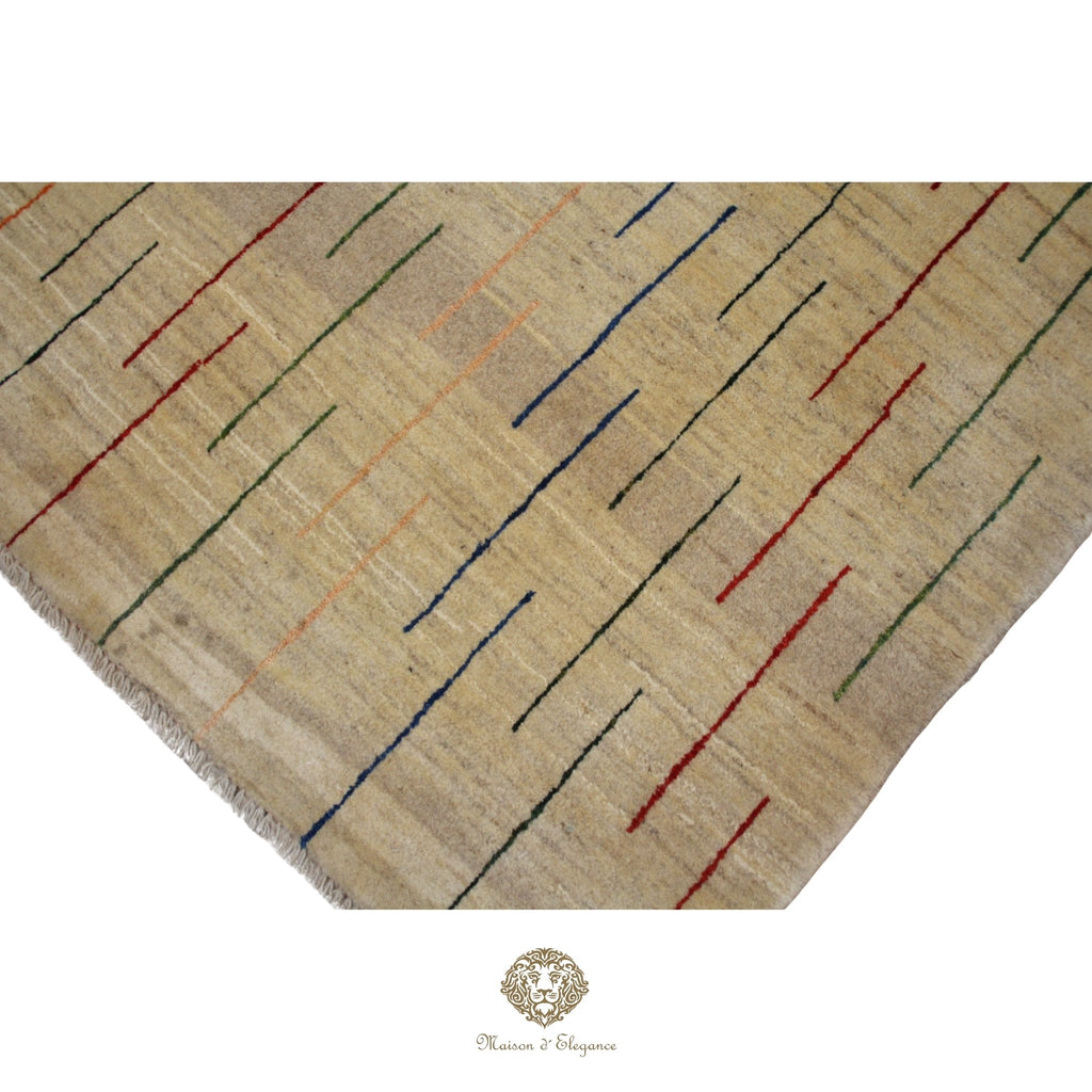 Beige rug with colorful geometric pattern on a Ivory background