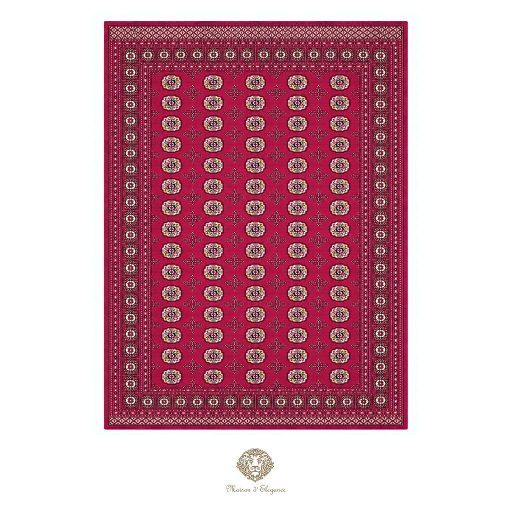 Red patterned rug with intricate design on a red background