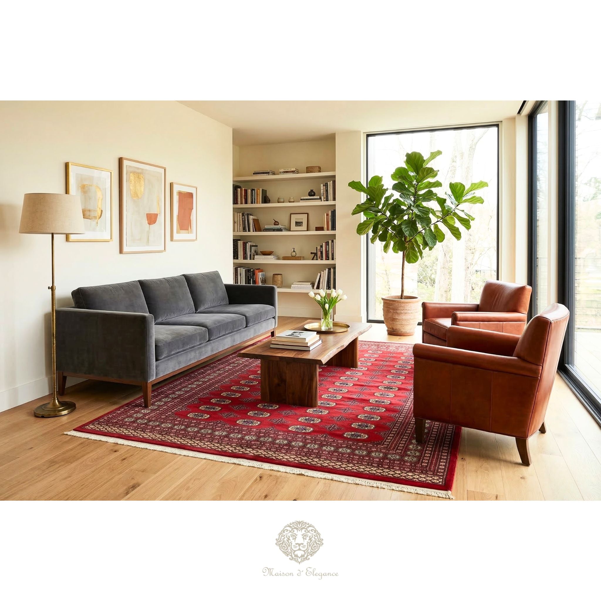 Modern living room with gray sofa, brown armchair, and red patterned rug.