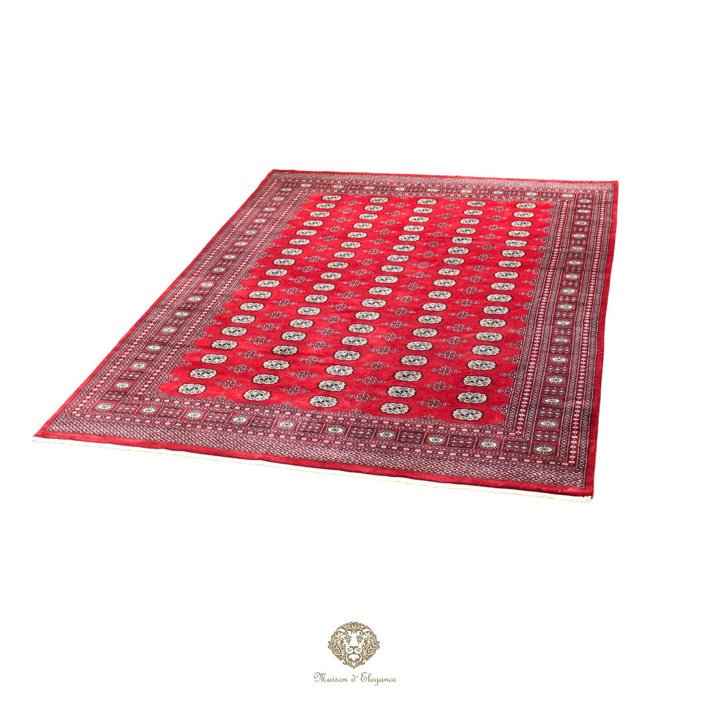 Red patterned rug on a red background