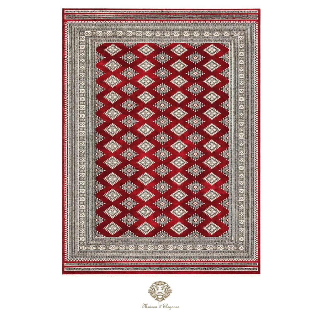Red and gray patterned rug with a brand logo at the bottom center.