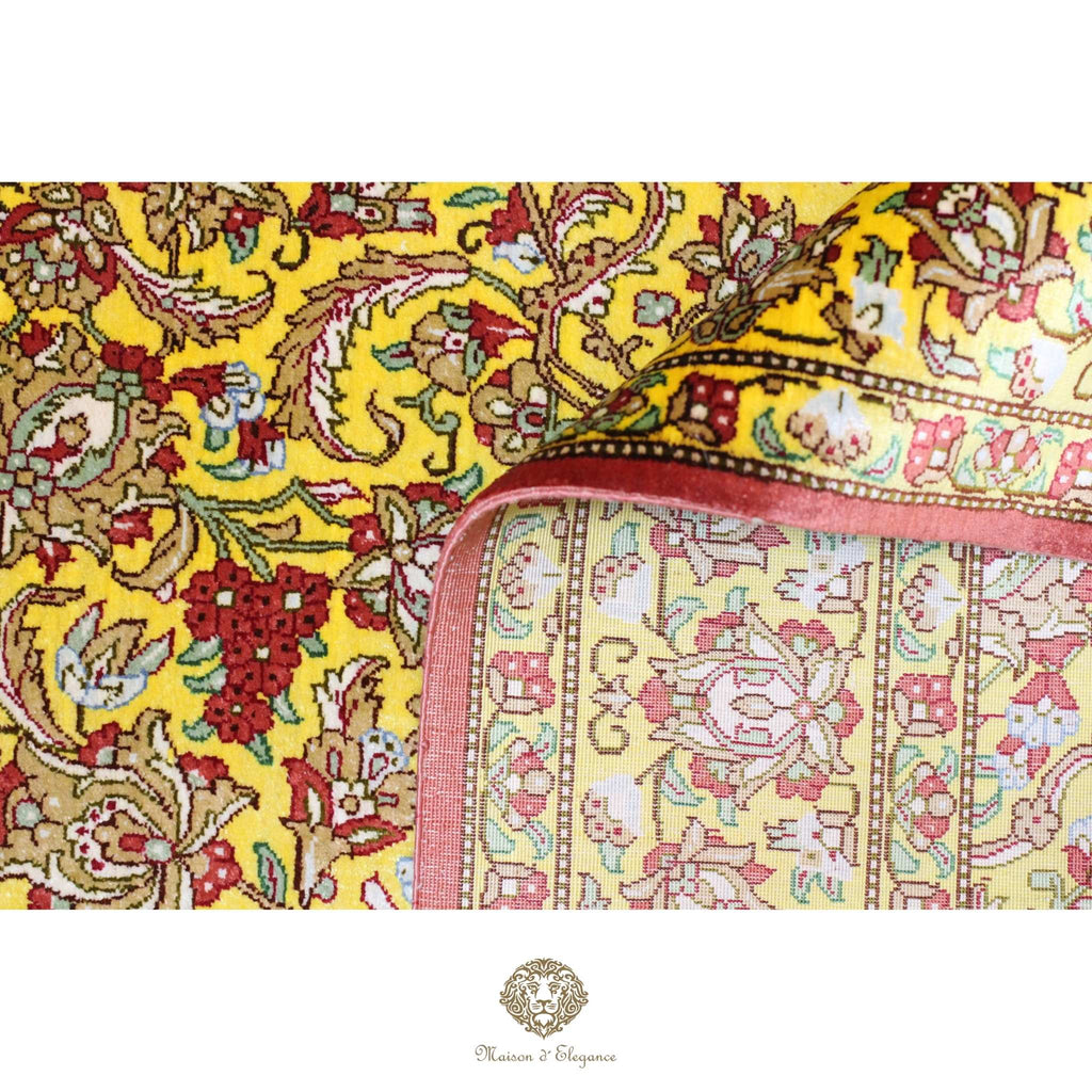 Decorative fabric with intricate patterns on a yellow background