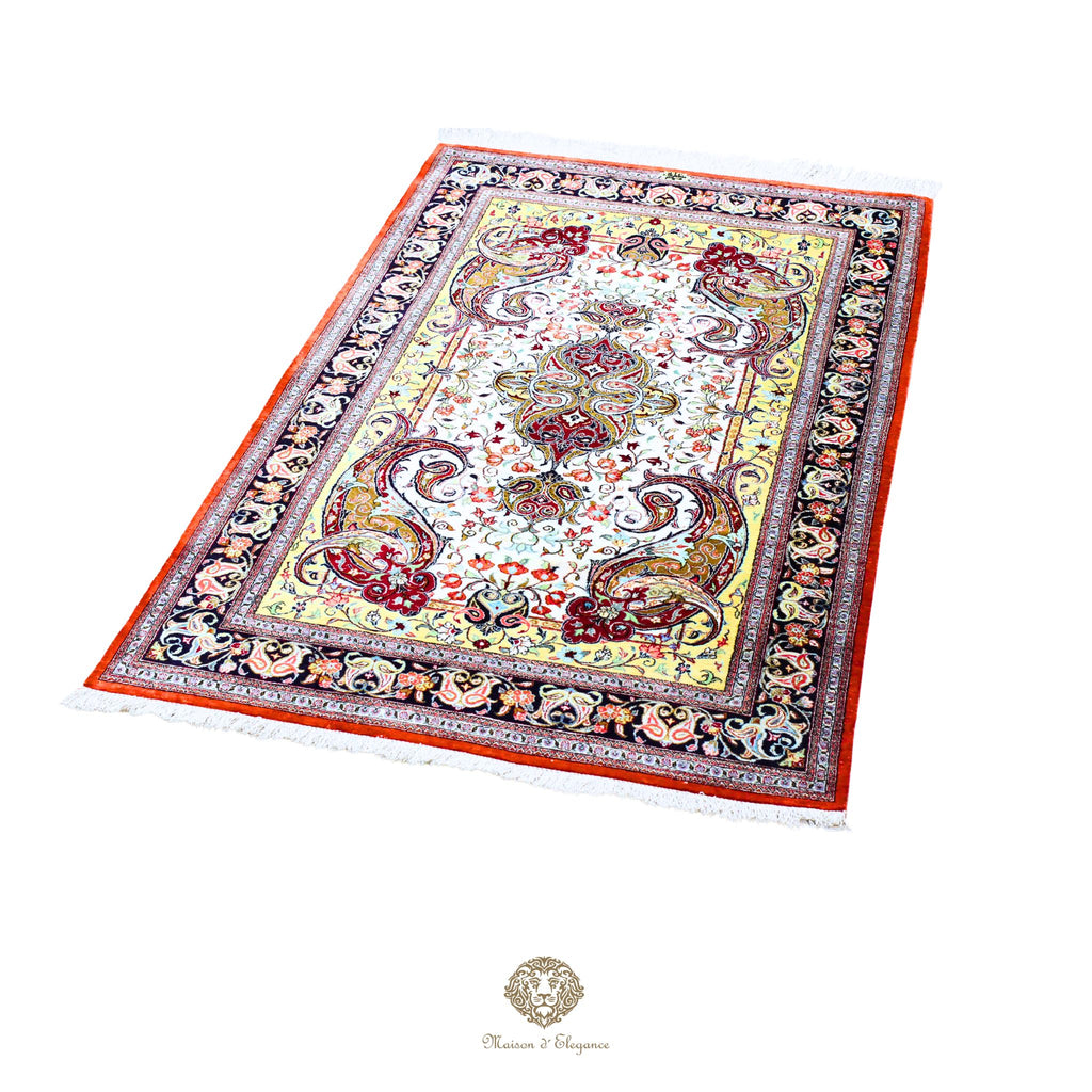 Decorative rug with intricate paisley pattern on a white background