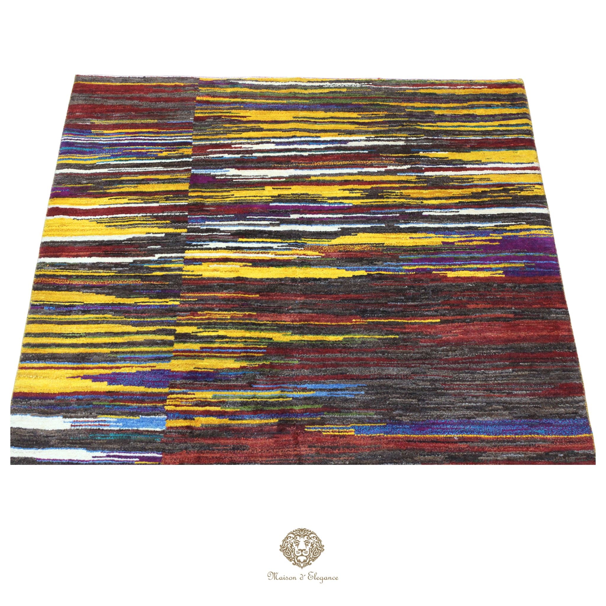 Multicolored striped rug with a brand logo at the bottom right corner on a colorfull background