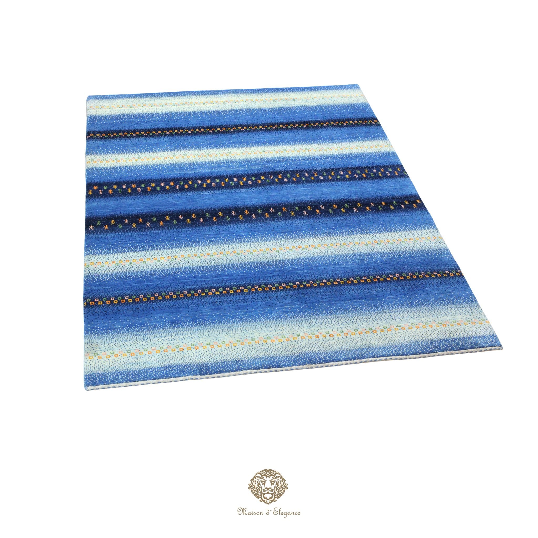 Blue striped rug with a brand logo at the bottom on a azul background