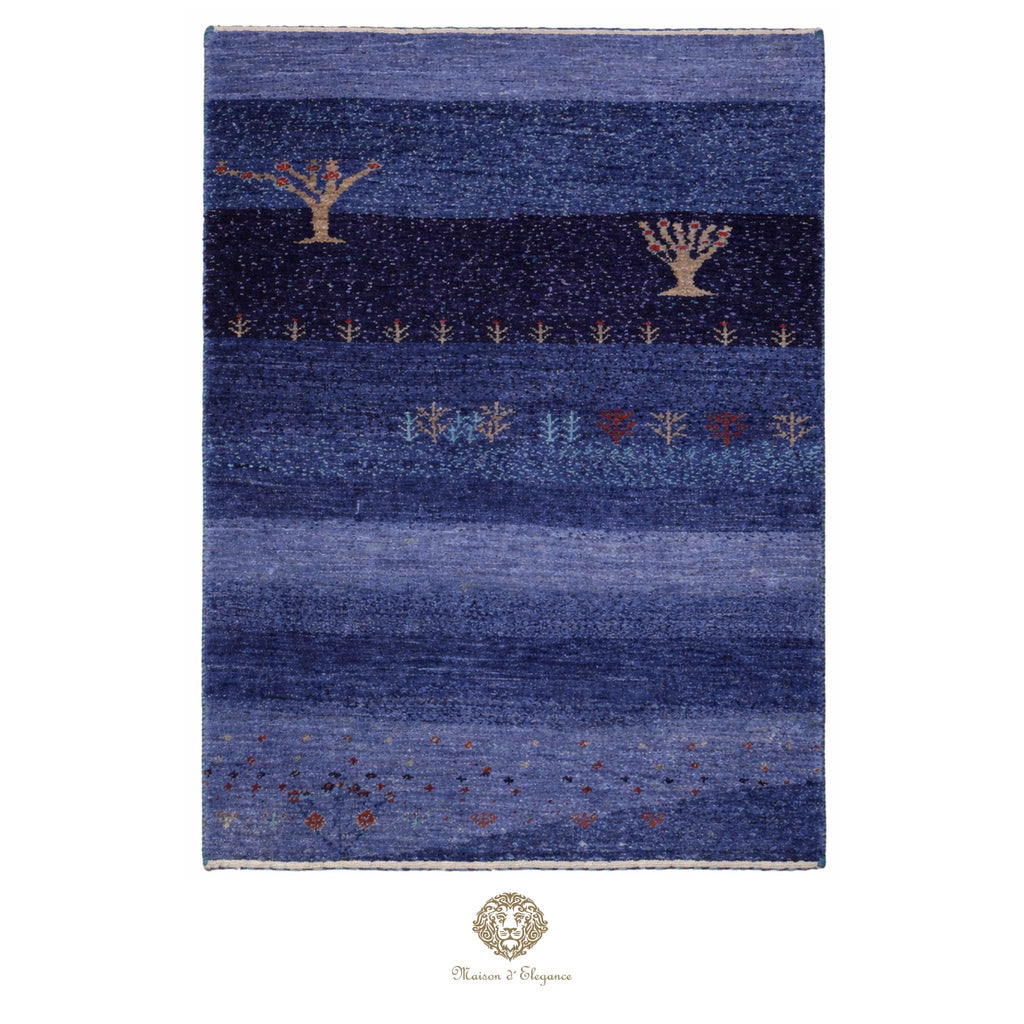 Blue patterned rug with tree designs on a white background