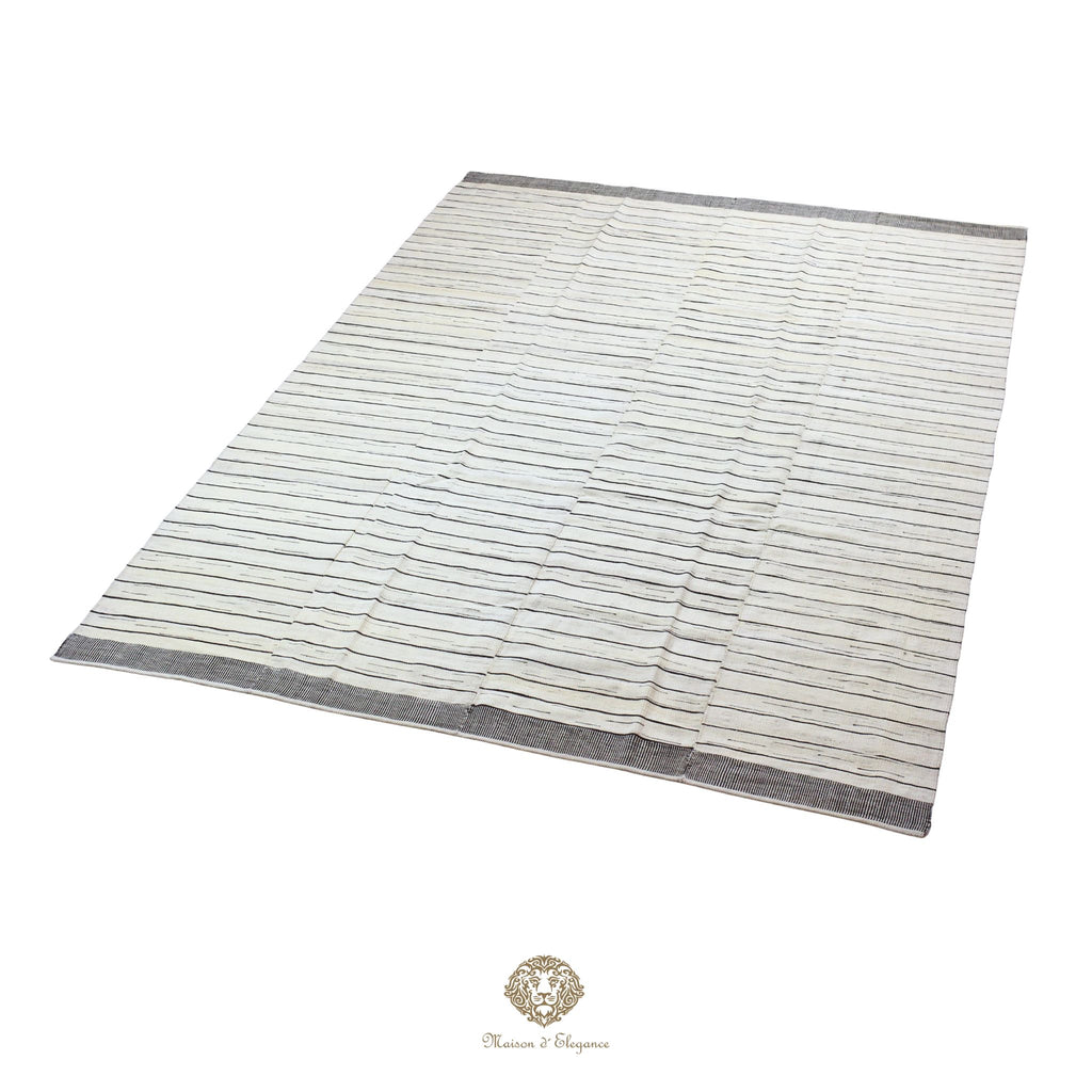 Striped rug with a subtle pattern on a white background
