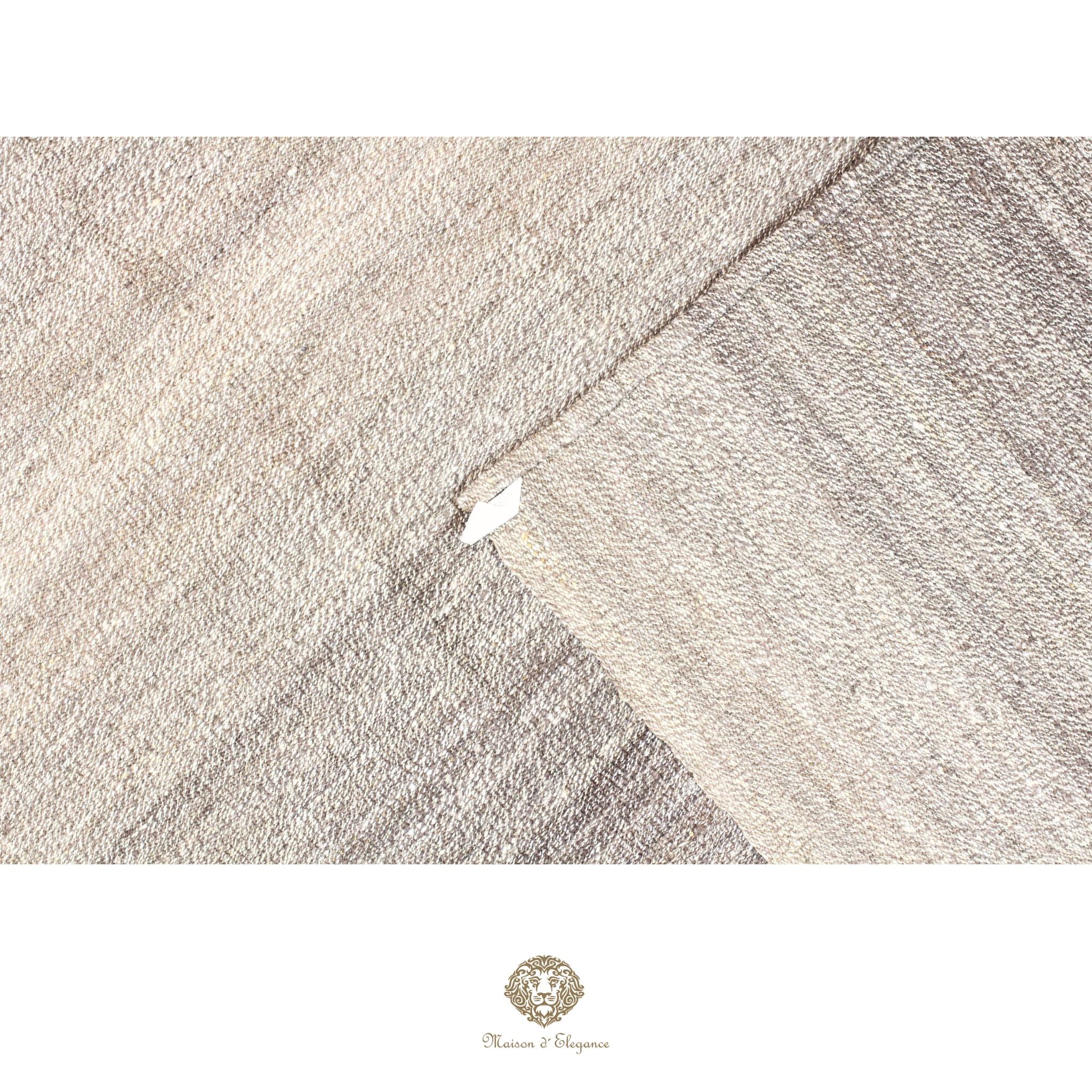 Textured fabric with a subtle pattern on a white background