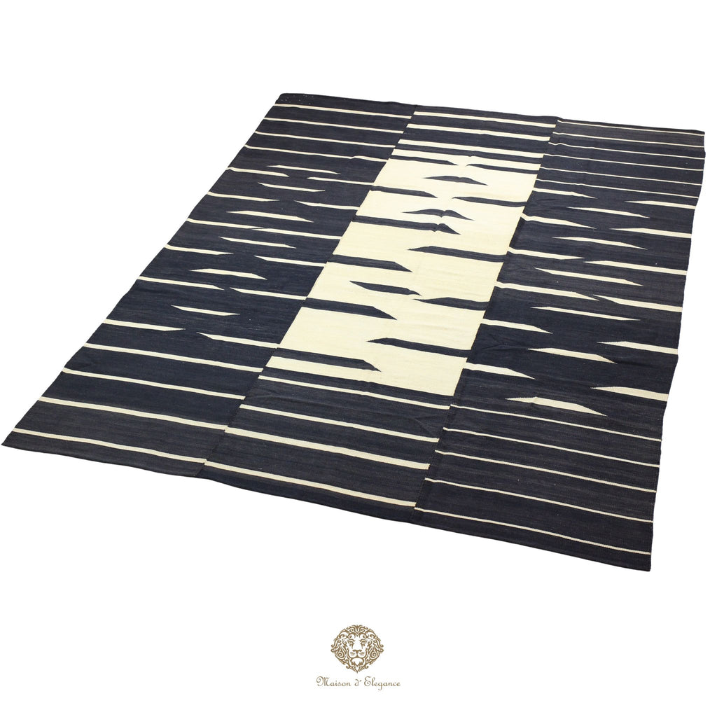 Black and white striped rug on a white background