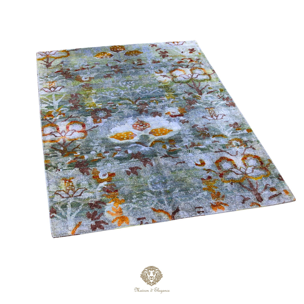 Floral patterned rug with a brand logo at the bottom right corner on a white background
