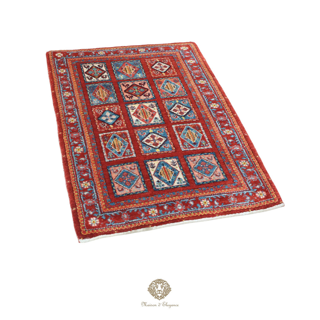 Decorative rug with geometric pattern on a red background