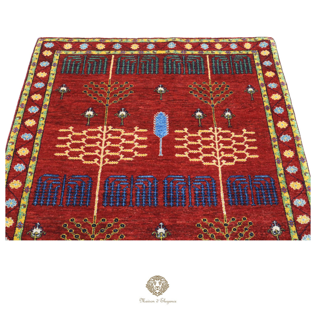 Decorative rug with intricate patterns on a red background