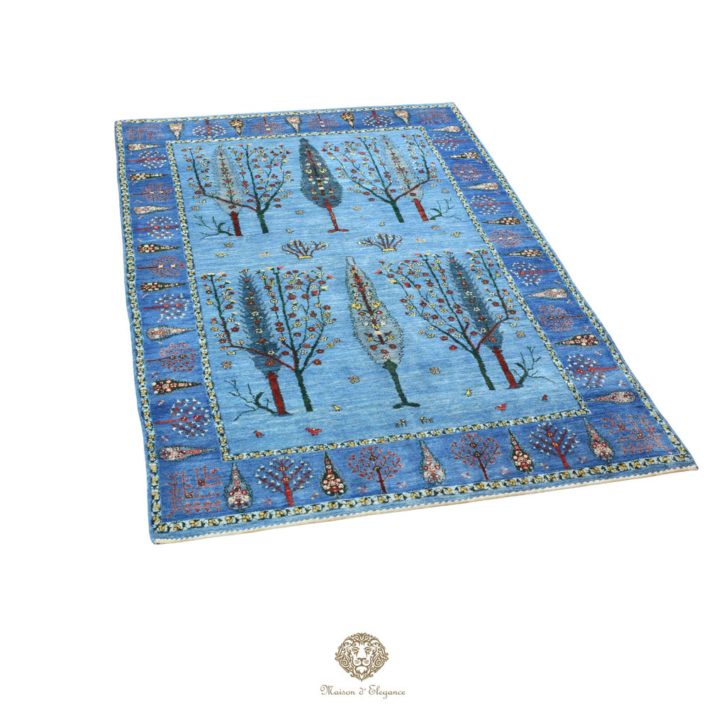 Decorative rug with tree pattern on a blue background