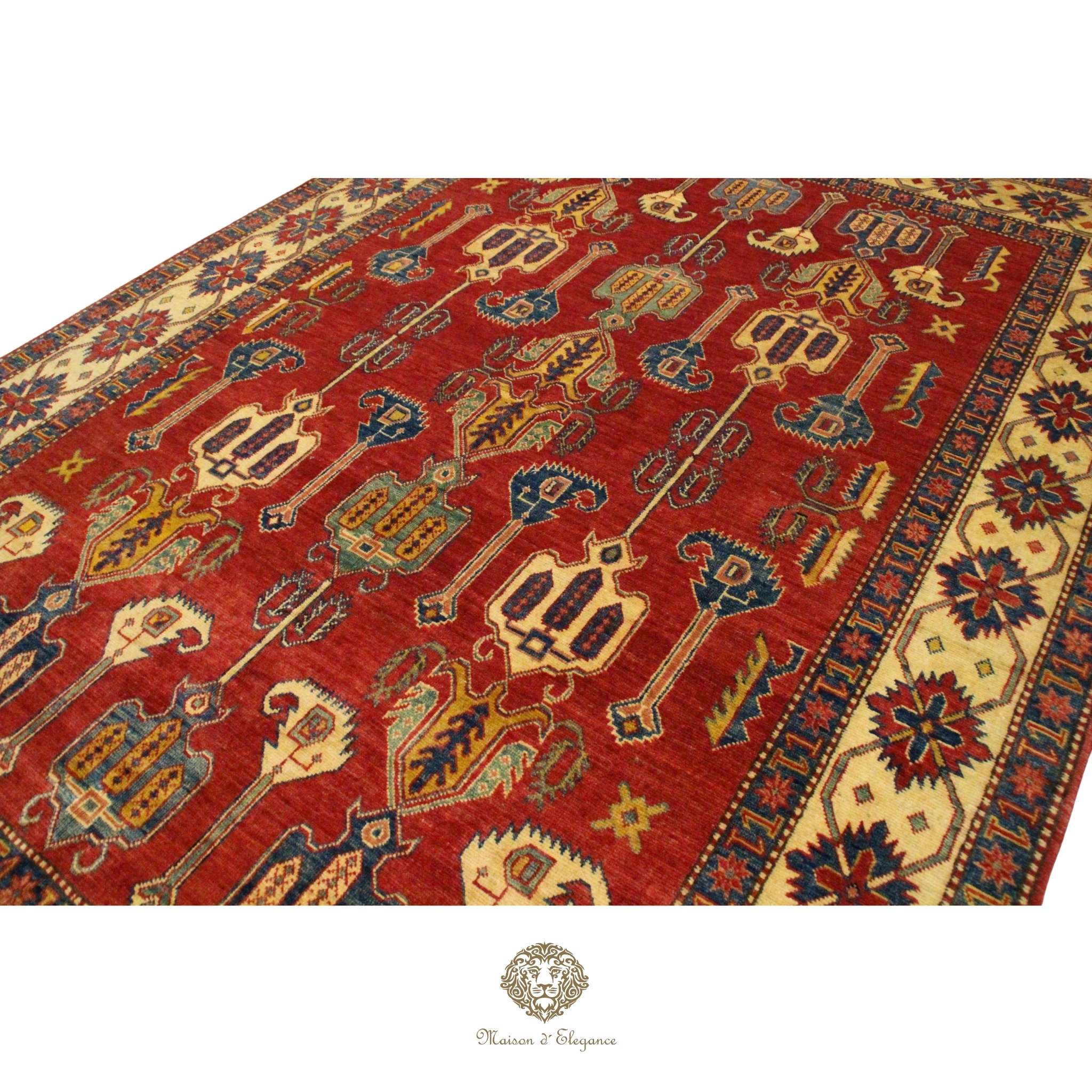 Decorative red rug with intricate patterns on a Burgundy background