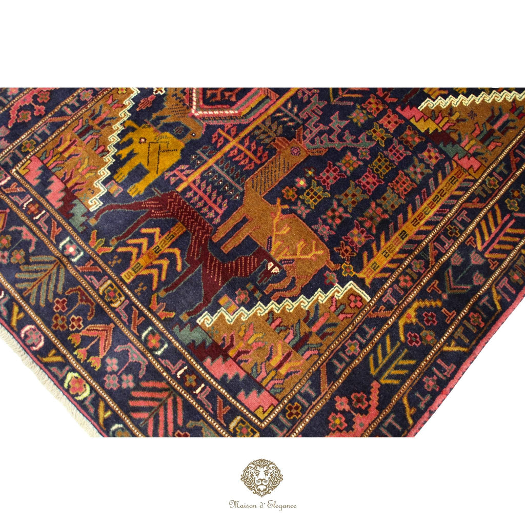 Decorative rug with intricate patterns and colors, featuring animals and geometric designs.
