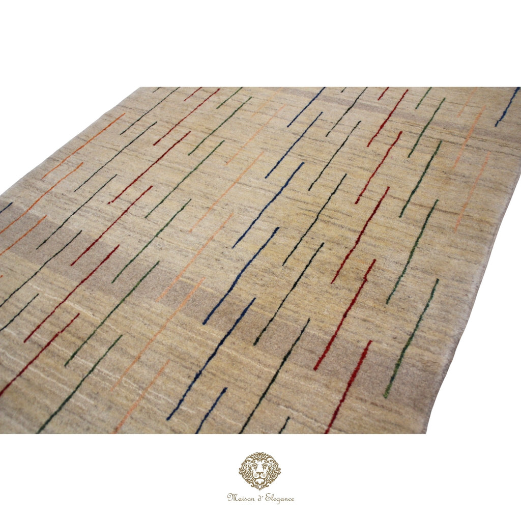 Beige rug with colorful geometric pattern on a Ivory background