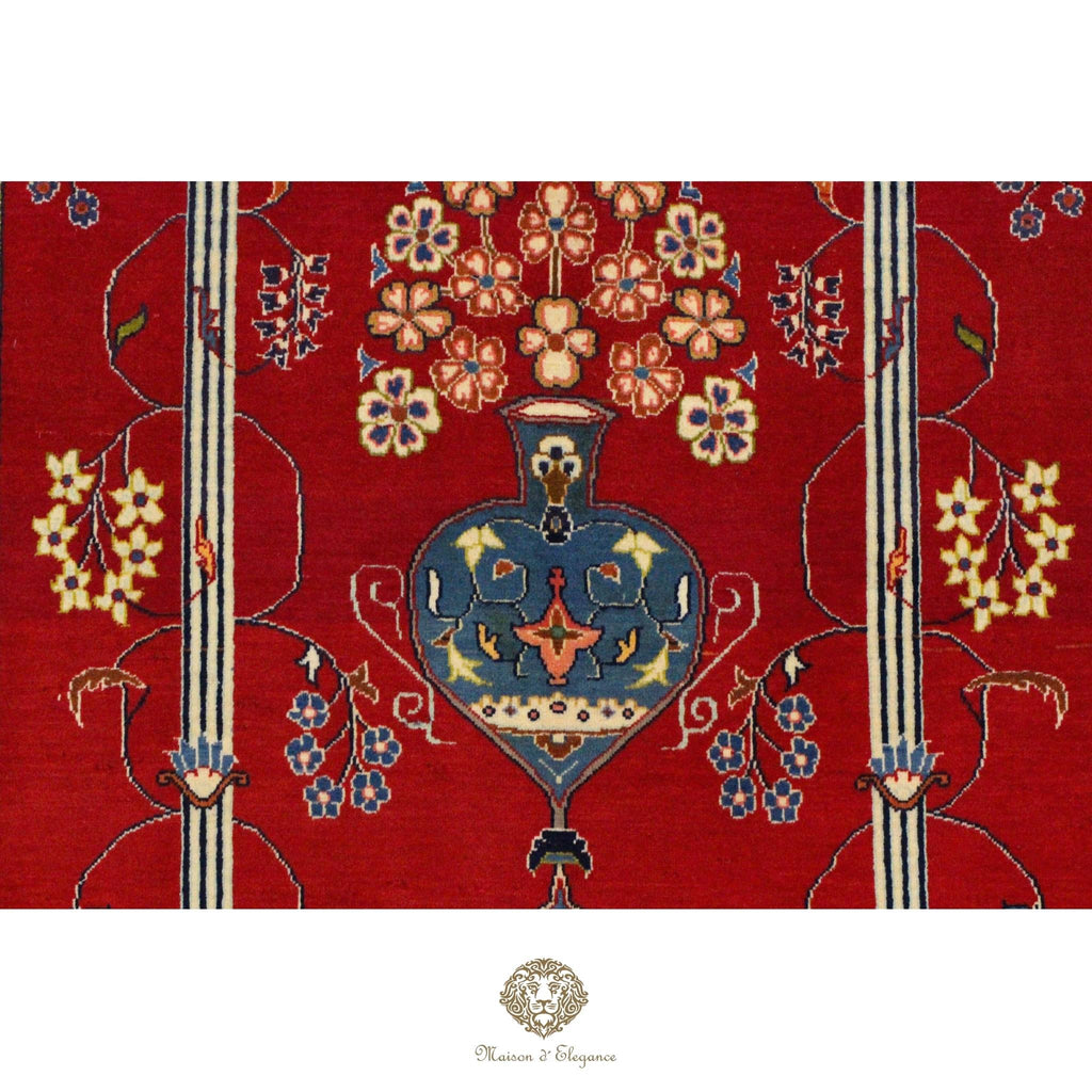 Decorative rug with floral and vase pattern on a red background