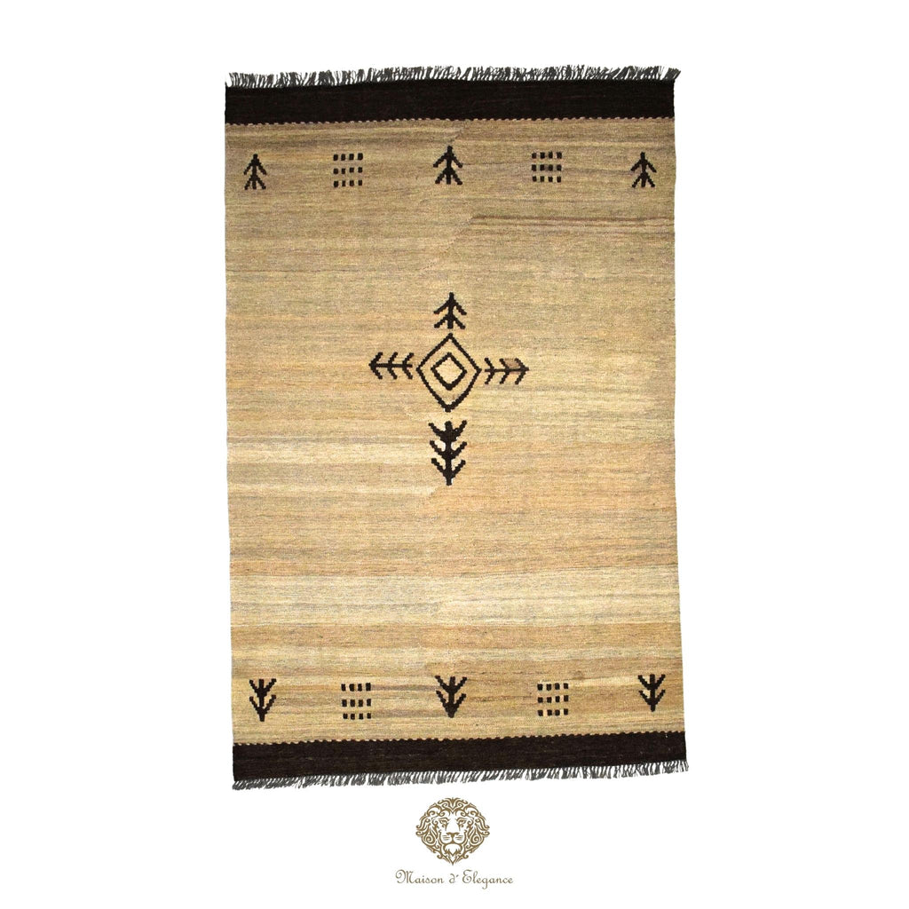 Beige rug with black geometric patterns on a ivory background