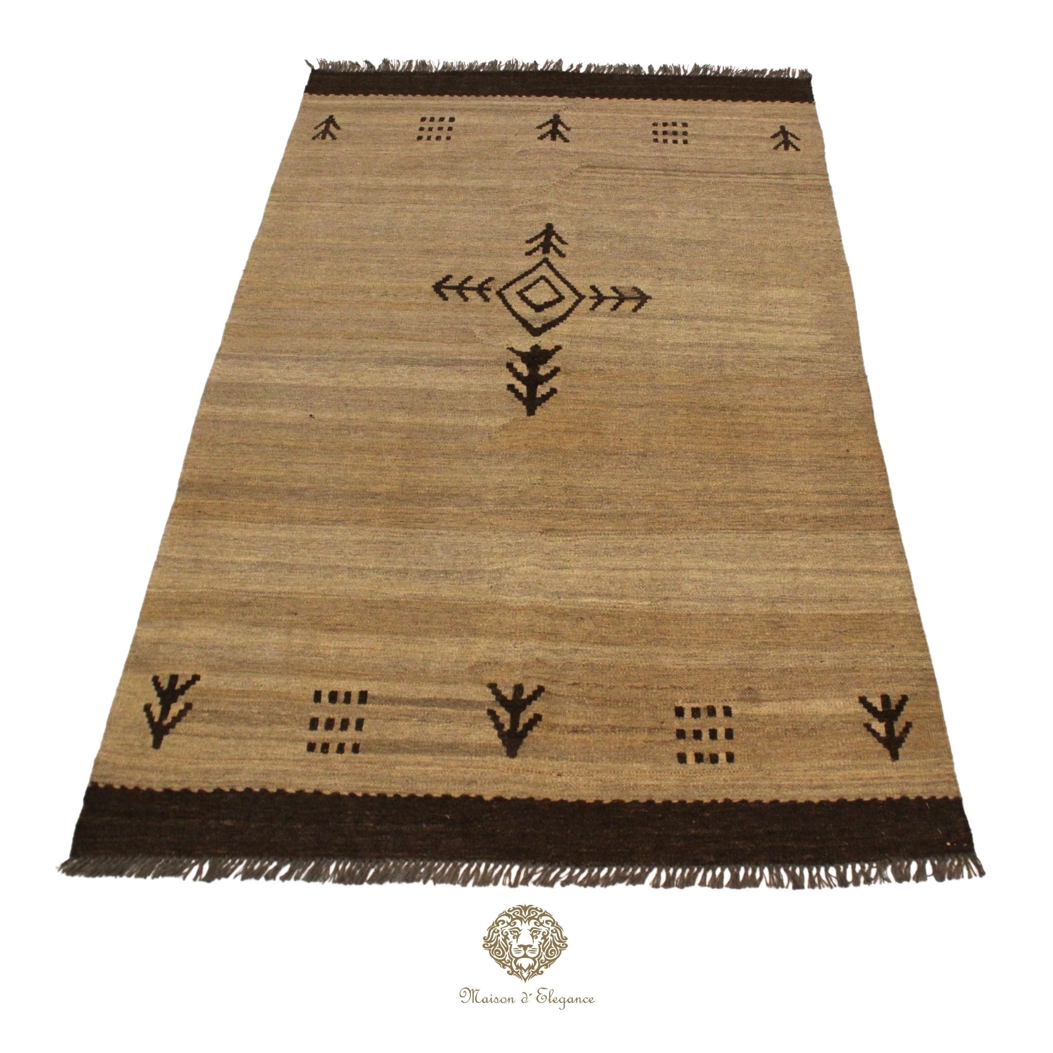 Beige rug with black geometric patterns on a ivory background