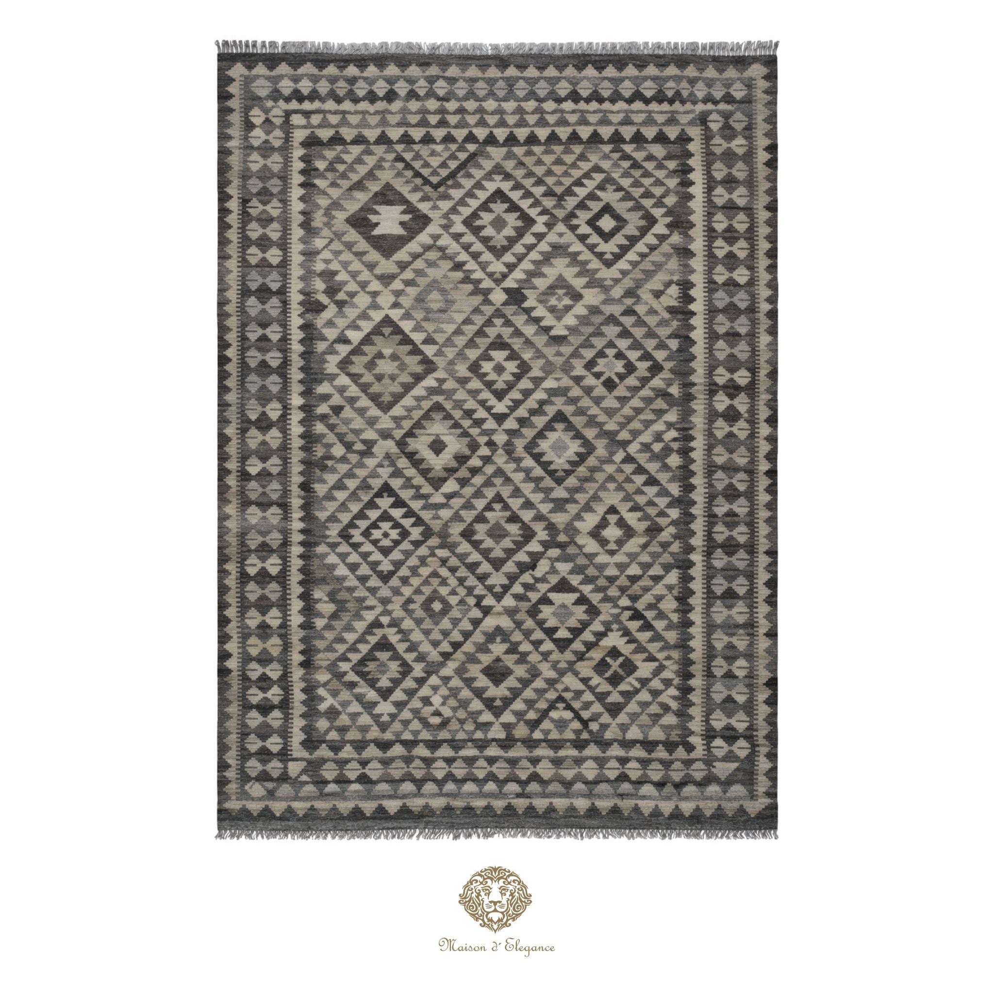 Patterned rug with geometric design on a white background, featuring the brand 'Chandra Rugs'.