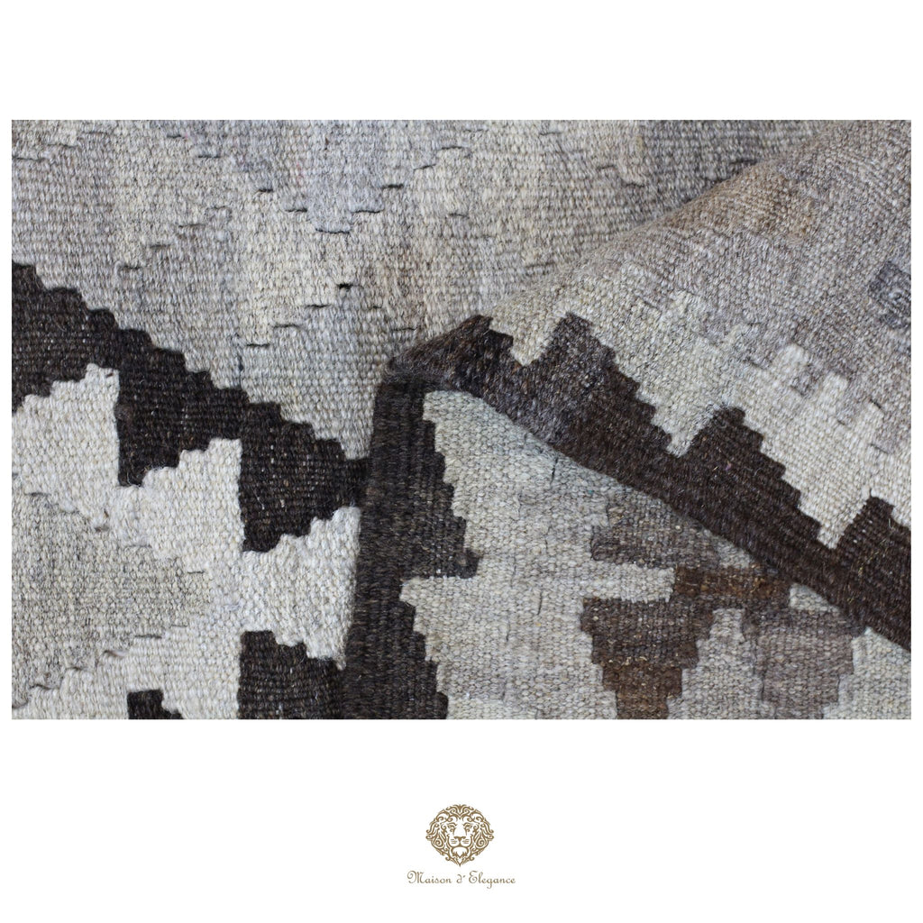 Textured rug with geometric pattern on a white background