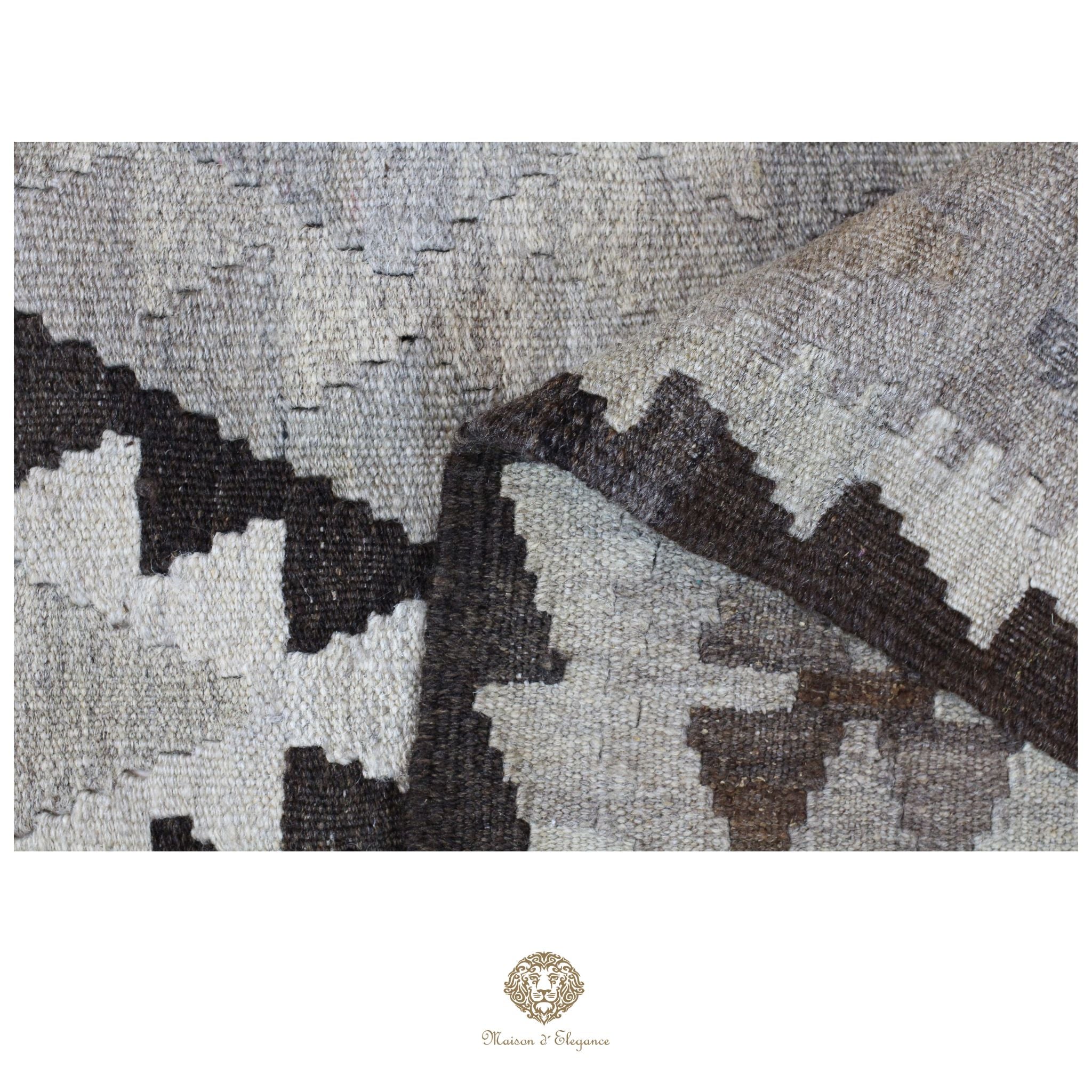 Textured rug with geometric pattern on a white background