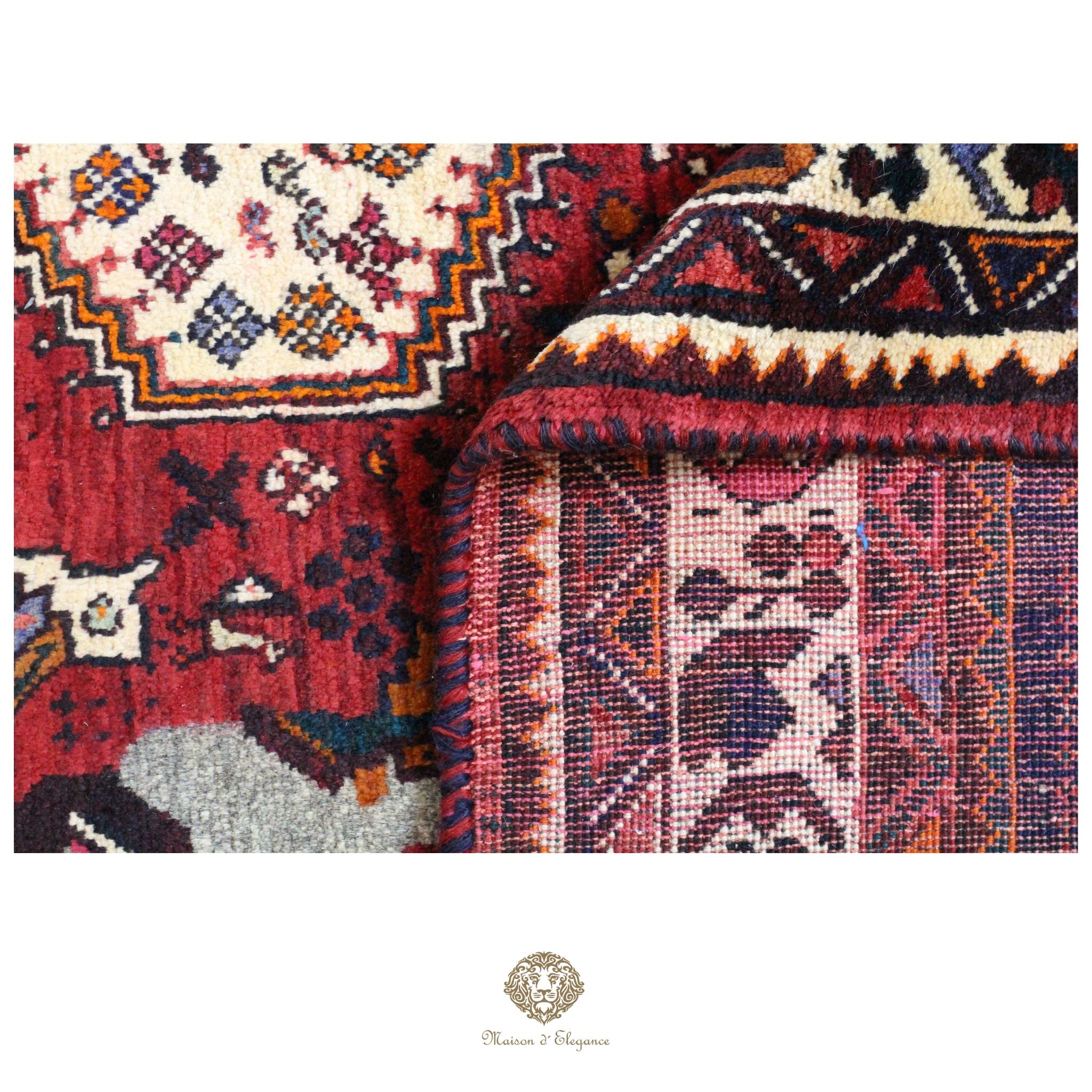 Close-up of a patterned rug with intricate designs on a white background.