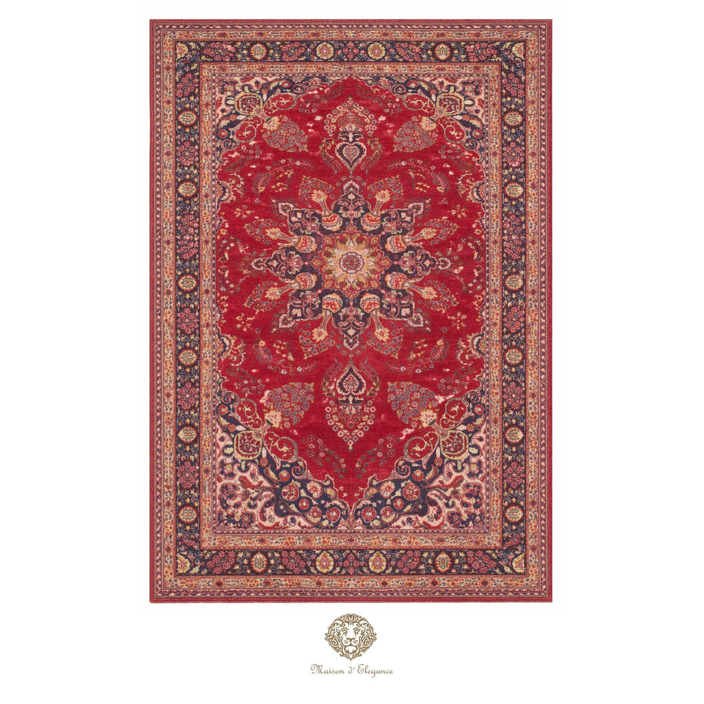 Decorative rug with intricate red and gold pattern on a white background
