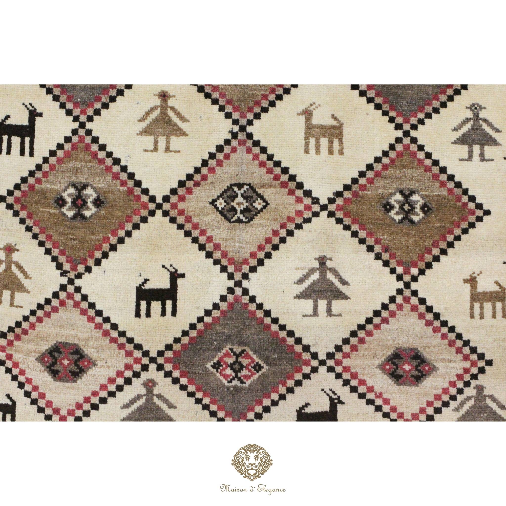 Patterned rug with geometric design featuring animals and people on a beige background.