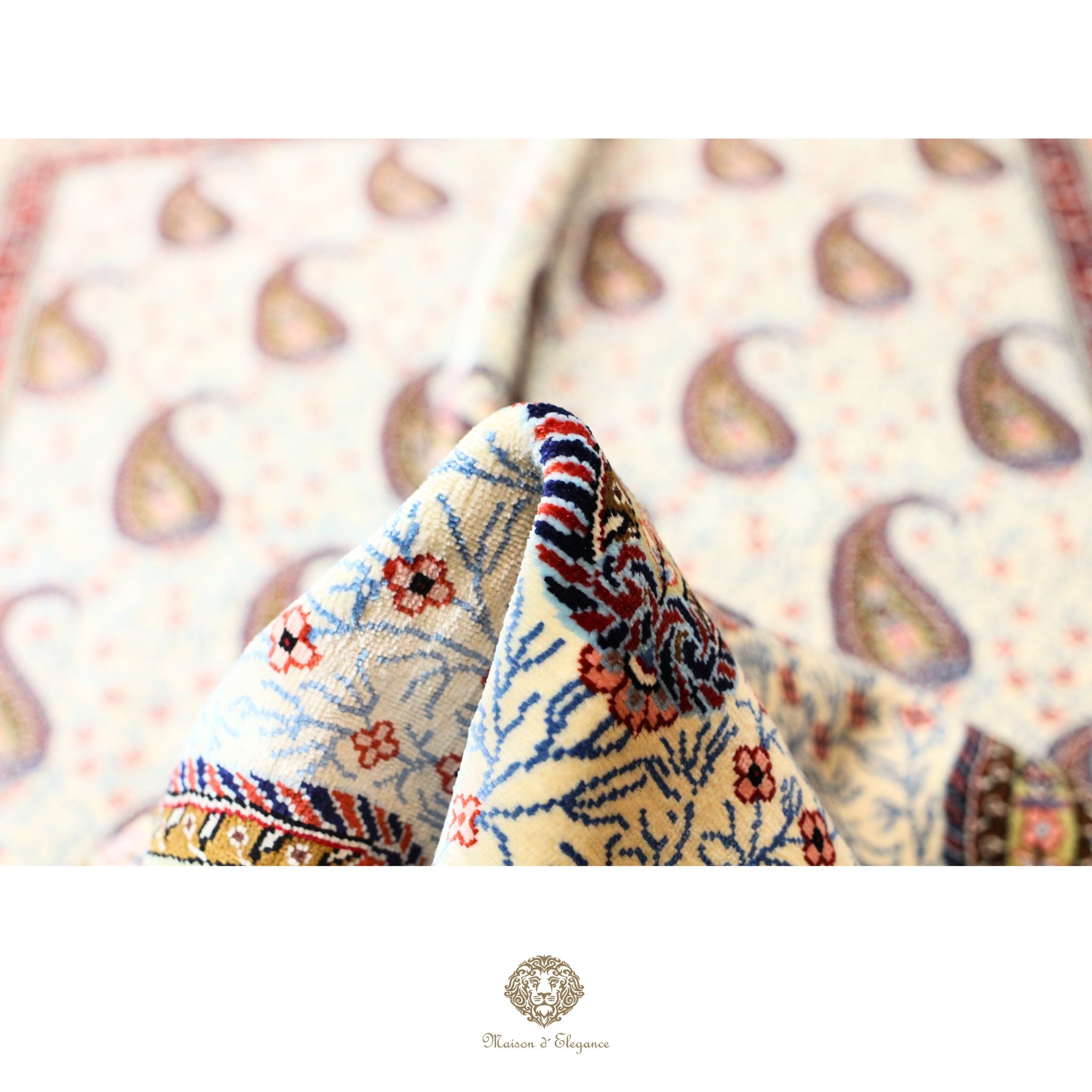 Close-up of patterned fabric with a blurred paisley design in the background