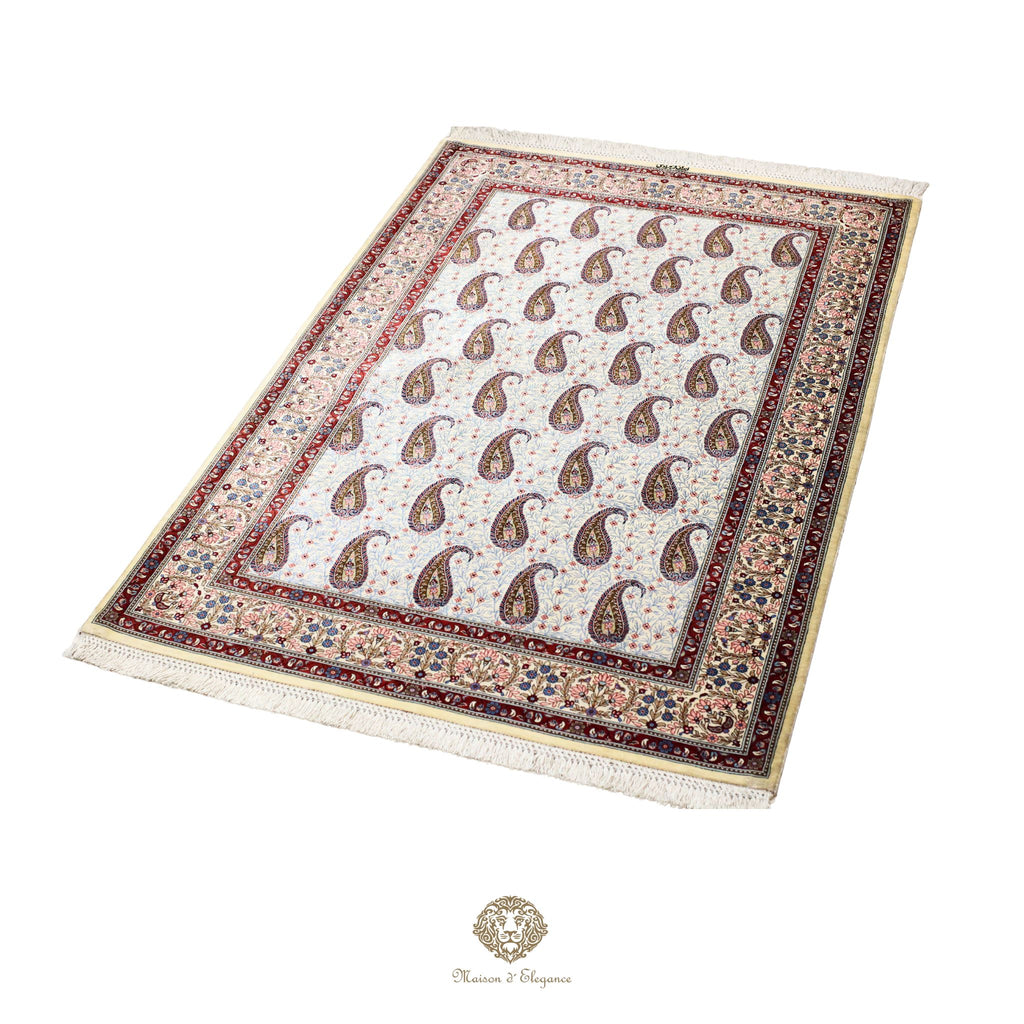 Decorative rug with paisley pattern on a white background