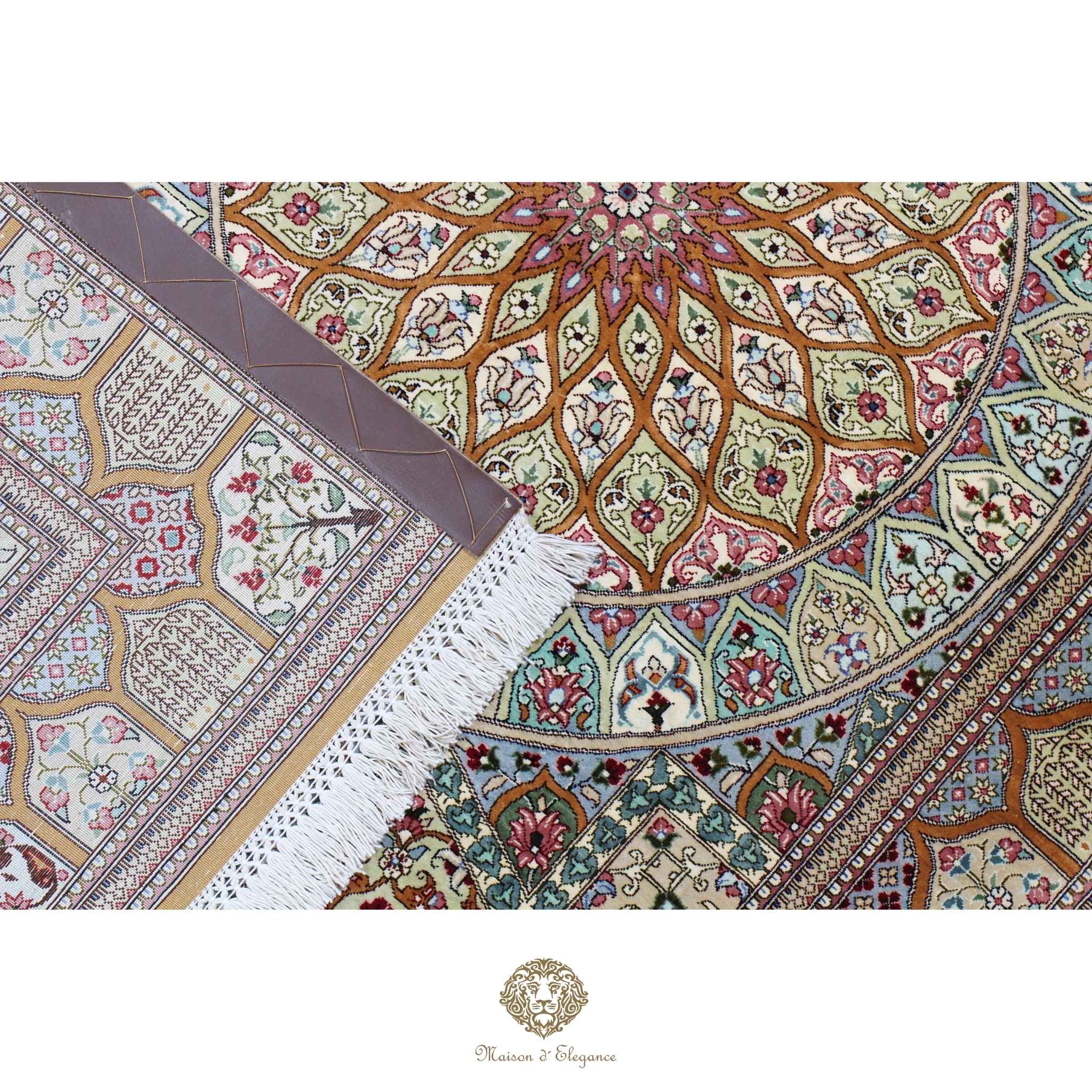 Decorative rug with intricate patterns and a brand logo at the bottom.