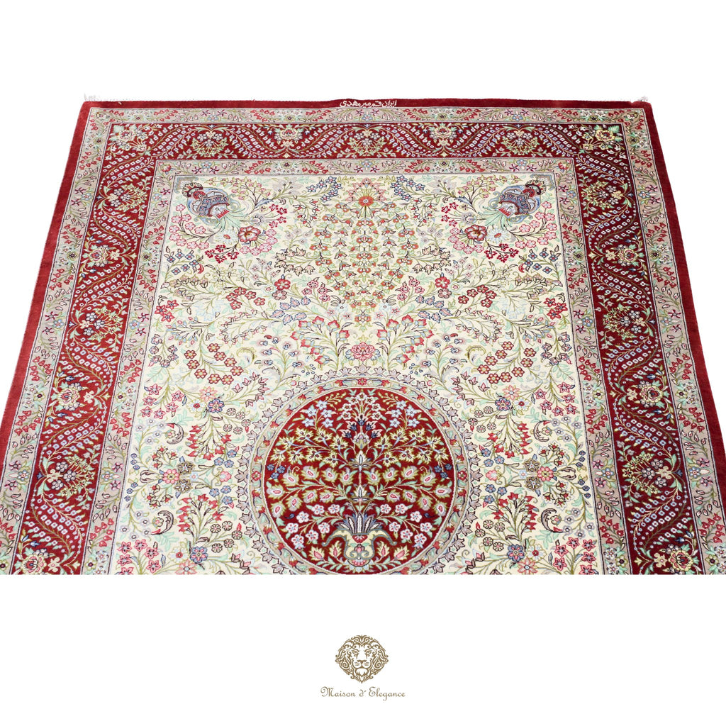 Decorative rug with intricate floral patterns on a white background