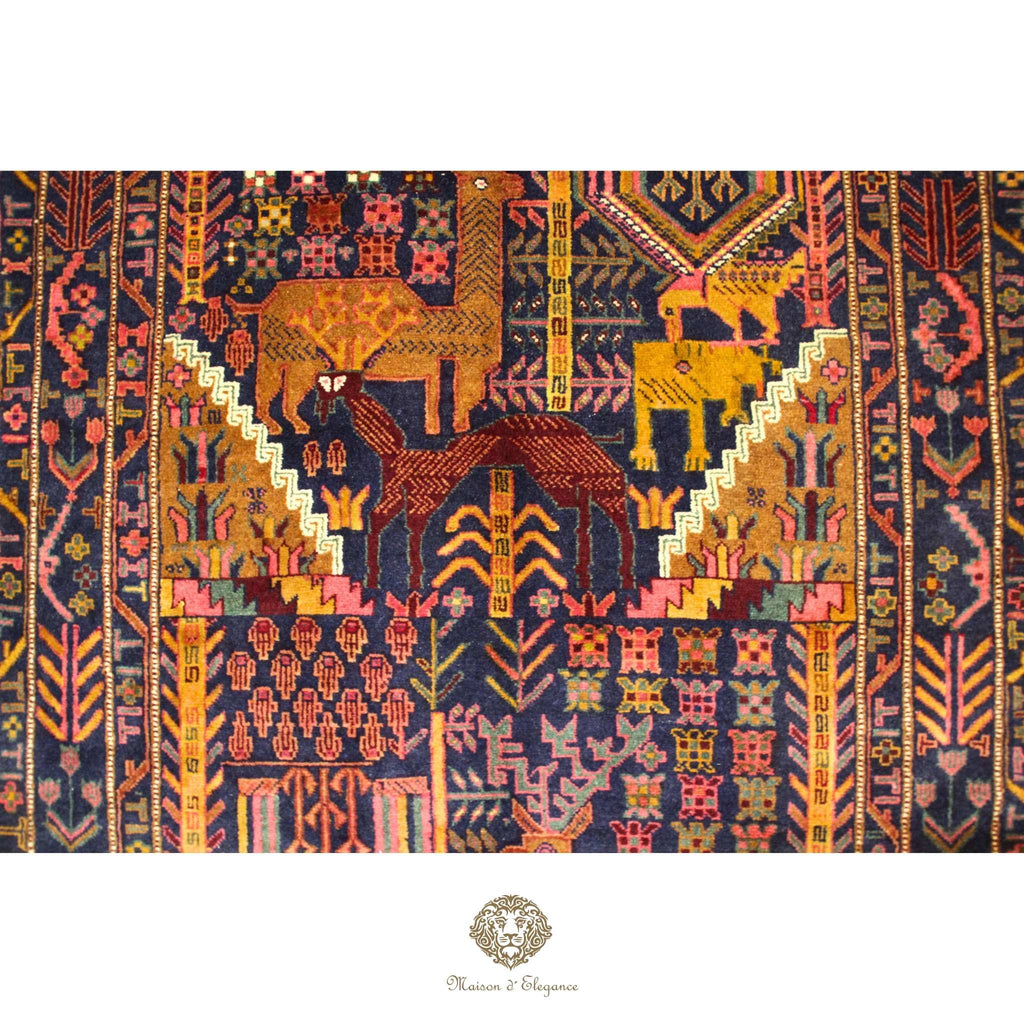 Decorative rug with intricate patterns and animals on a navy background