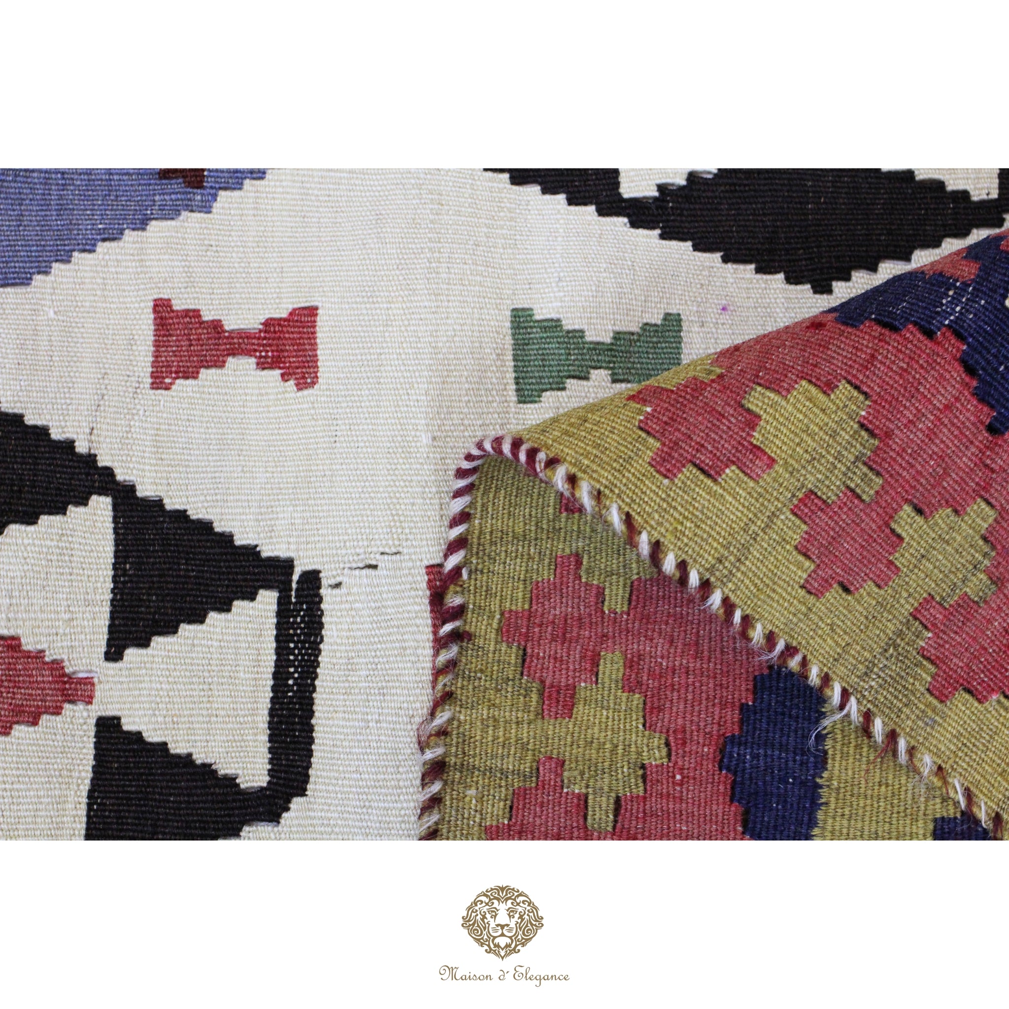 Close-up of a colorful patterned fabric with geometric designs on a white background.